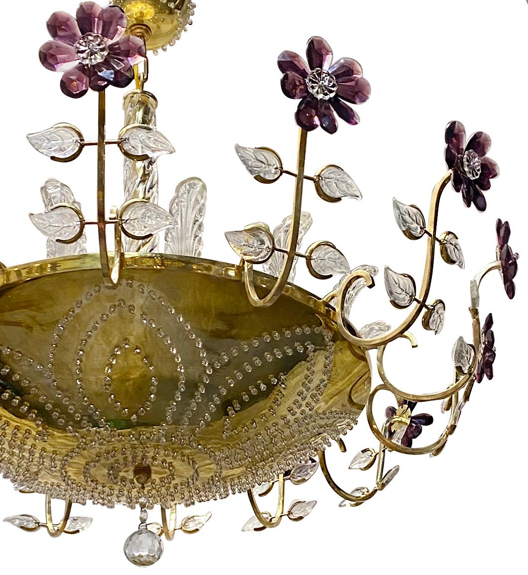 A circa 1950's French gilt light fixture with crystal insets in body and amethyst crystal flowers, molded glass leaves and six interior lights.

Measurements:
Current drop: 26