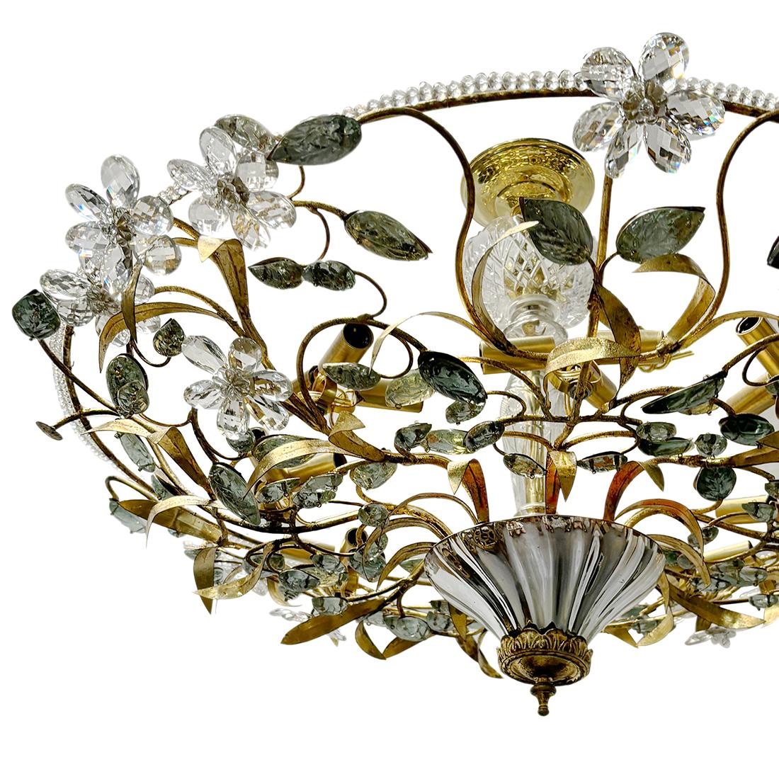 Apparecchio francese in vetro di mercurio e metallo patinato con foglie e fiori in vetro modellato e 24 luci interne a candelabro.

Misure:
Diametro: 35
Caduta minima: 24