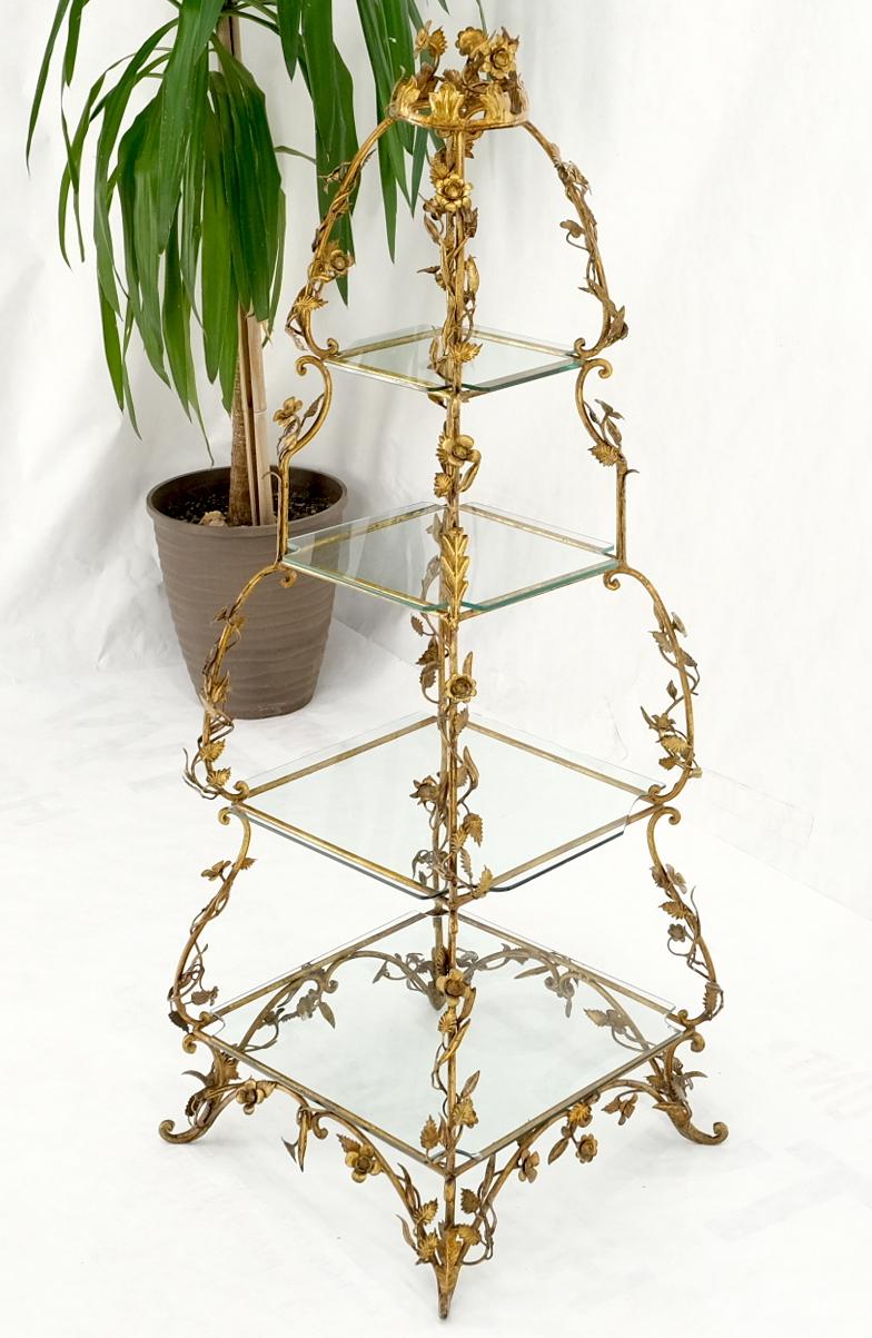 Gilt metal flowers decorated Italian pyramid shape display shelves etagere table.
4 Tier etagere decorative accent shelf display unit.
