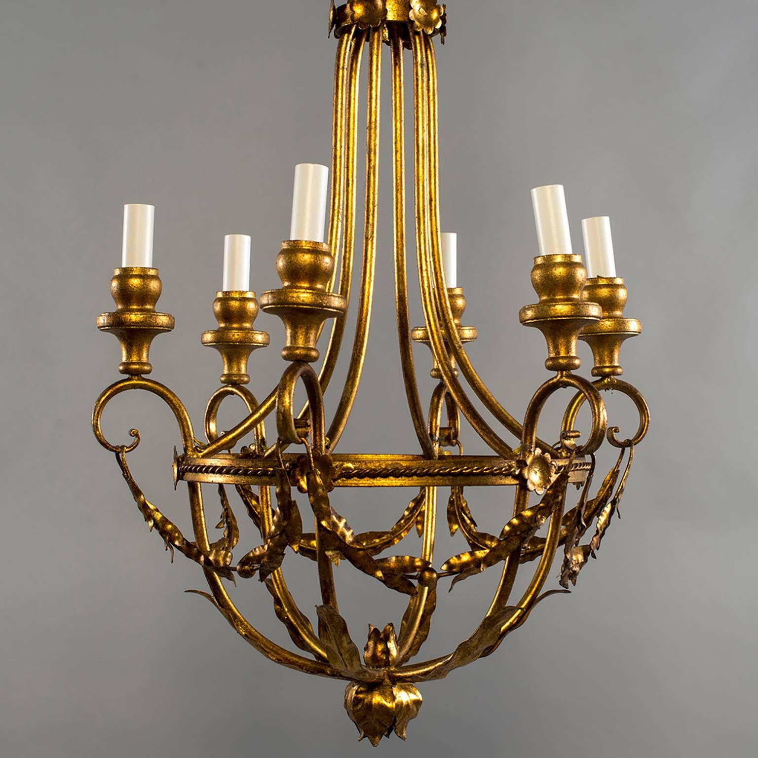 French six-light metal chandelier has basket shape, gilded finish, wooden bobeches and candle style lights. Original ceiling canopy included. New wiring for US electrical standards.
 