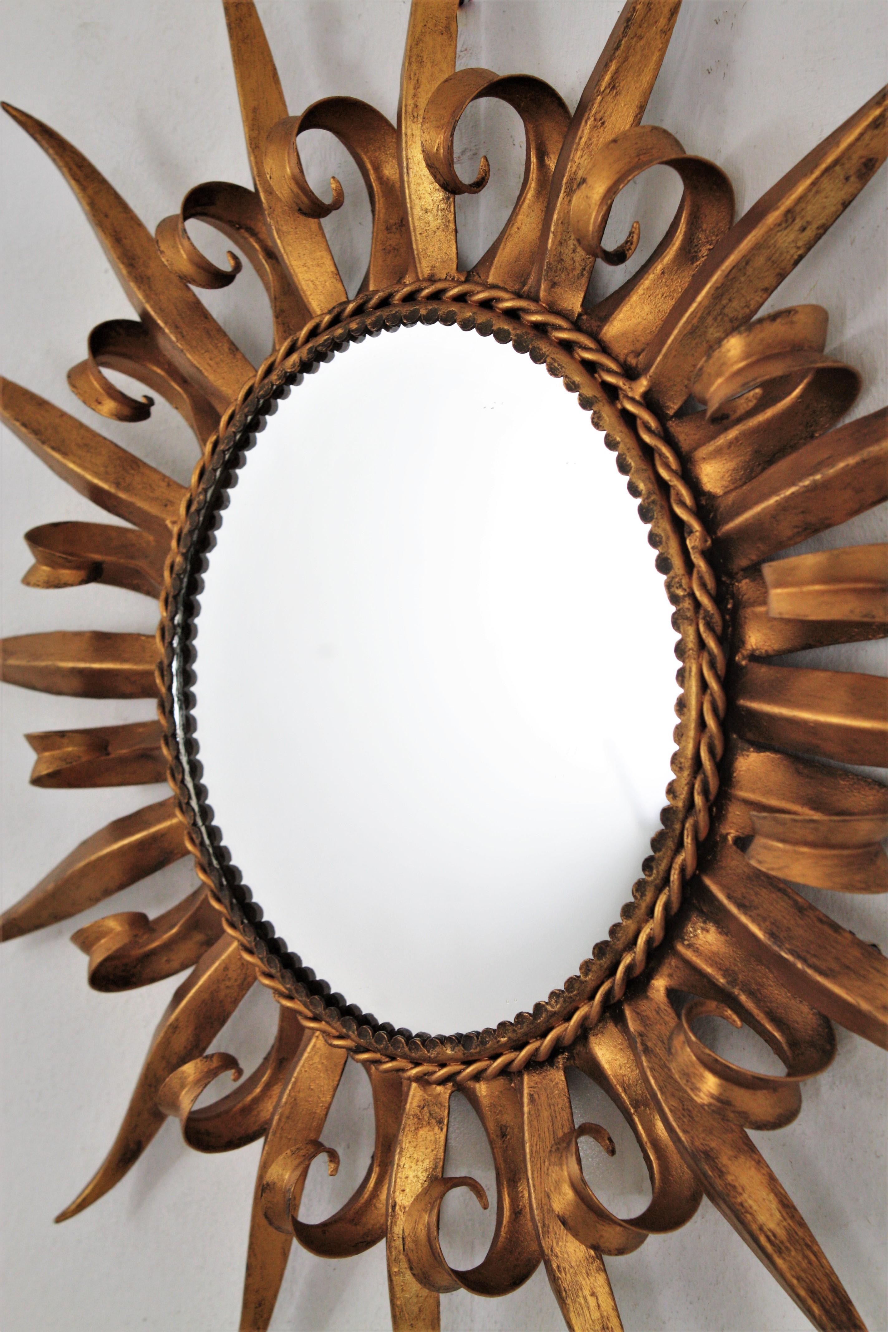 Mid-Century Modern French Sunburst Eyelash Mirror in Gilt Iron, 1950s For Sale