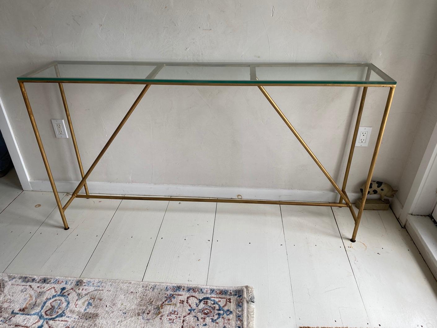 Elegant, contemporary and rustic at the same time with glass top and custom made metal base with a gold finish. Great as console or sofa table. Top and base can be sold separately by adding a top of your choice, be it glass, stone or wood. Base can