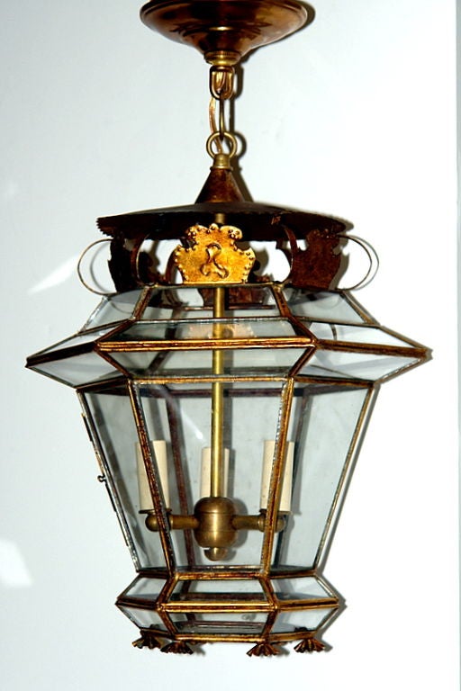 A 1930s Italian gilt metal lantern with three internal lights. Two available. Sold individually.

Measurements:
Height 20