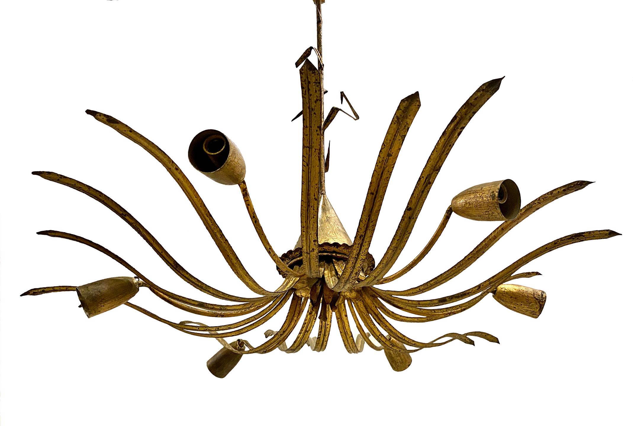 A circa 1950's Italian foliage motif gilt metal six-arm chandelier with original finish.

Measurements:
Minimum drop: 30