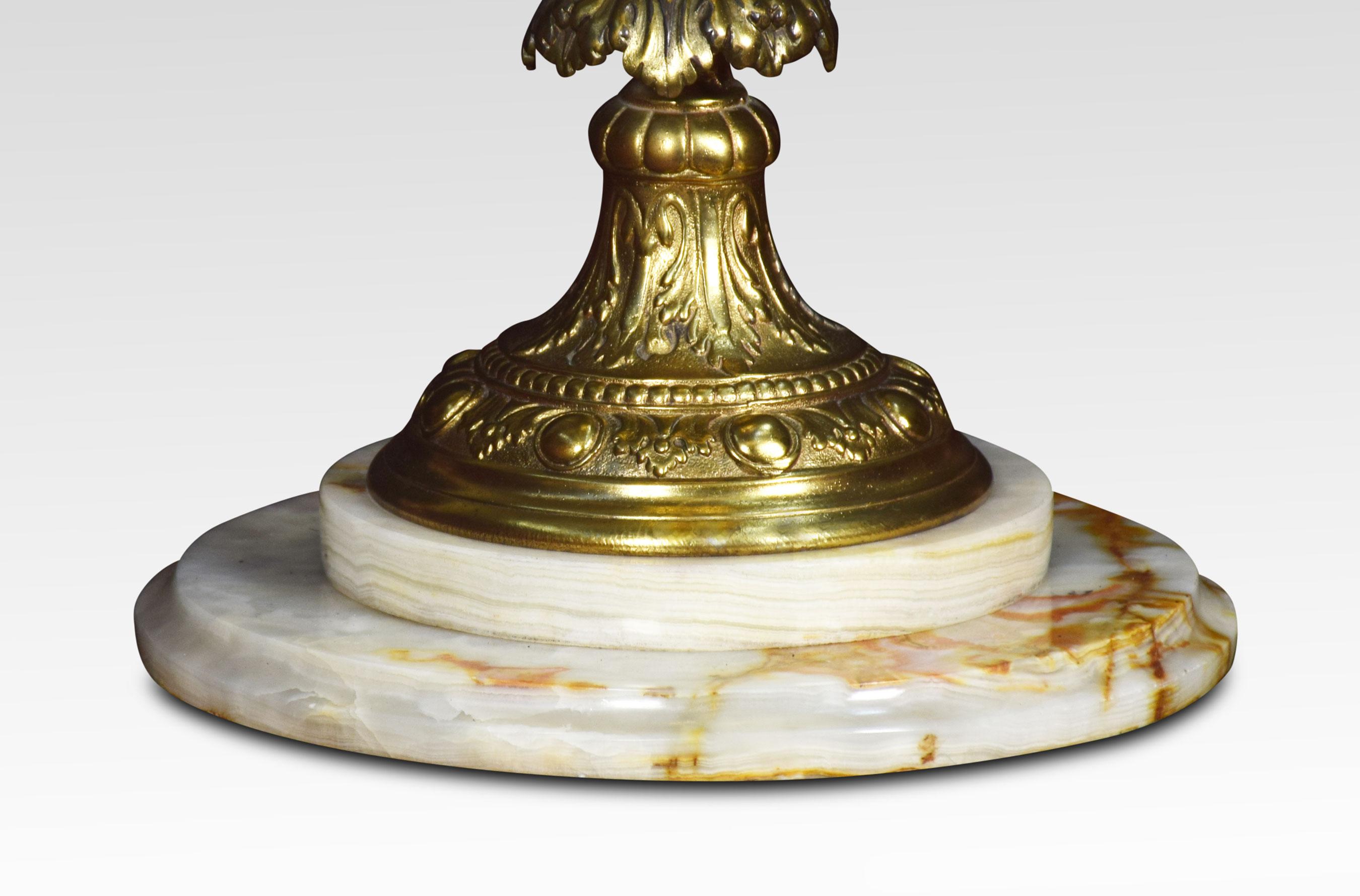 Gilt metal Medici urn table lamp the large ewer with dragon-headed foliated scrolling handle raised up on a marble base.
Dimensions:
Height 33.5 inches
Width 10.5 inches
Depth 10.5 inches.