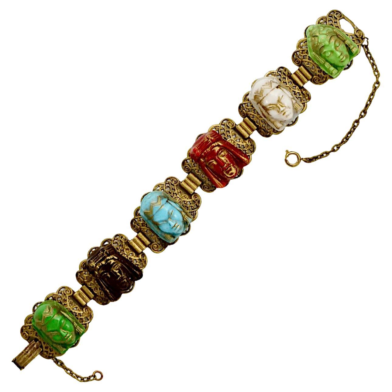 Gilt Metal Ornate Coloured Glass Faces Bracelet with Safety Chain For Sale