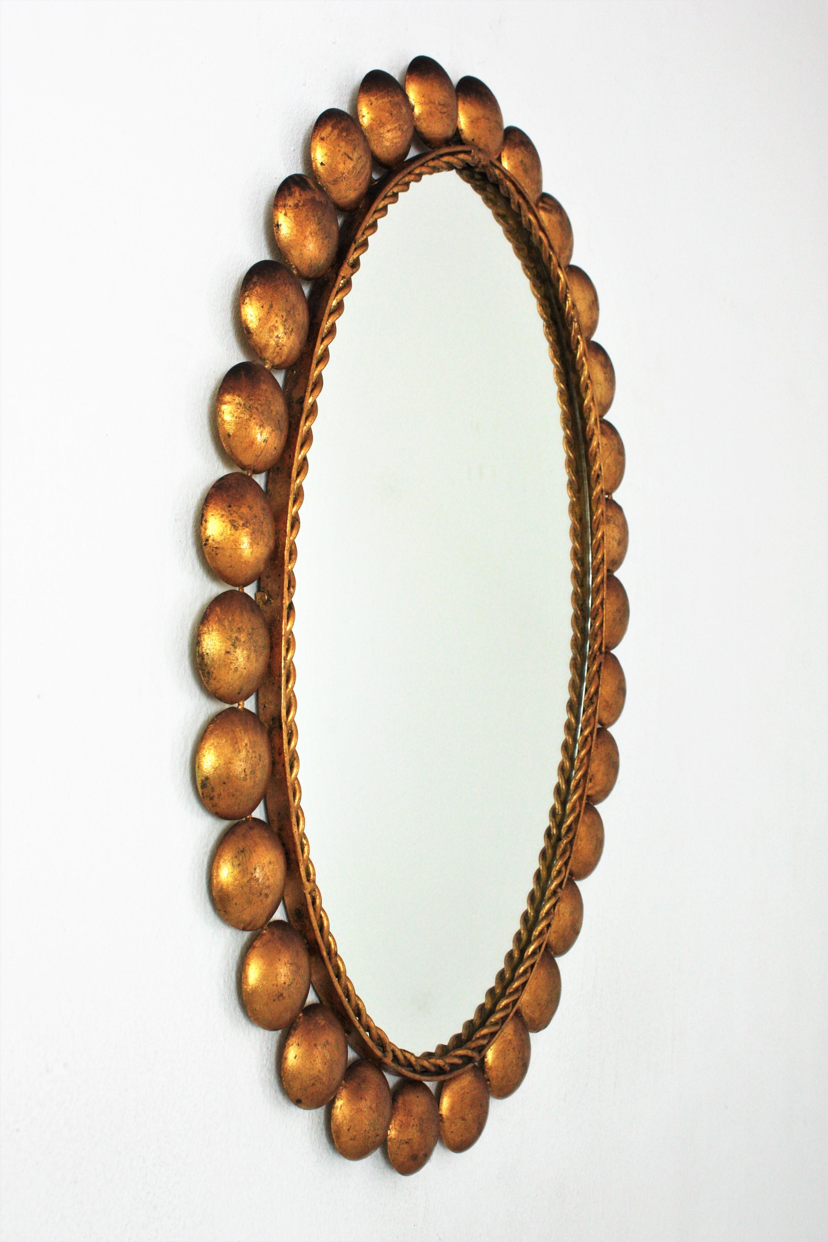 Mid-Century Modern Oval Mirror with Balls Frame, Gilt Metal For Sale
