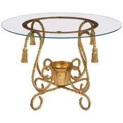 Table en métal doré en forme de corde avec ornementation de glands