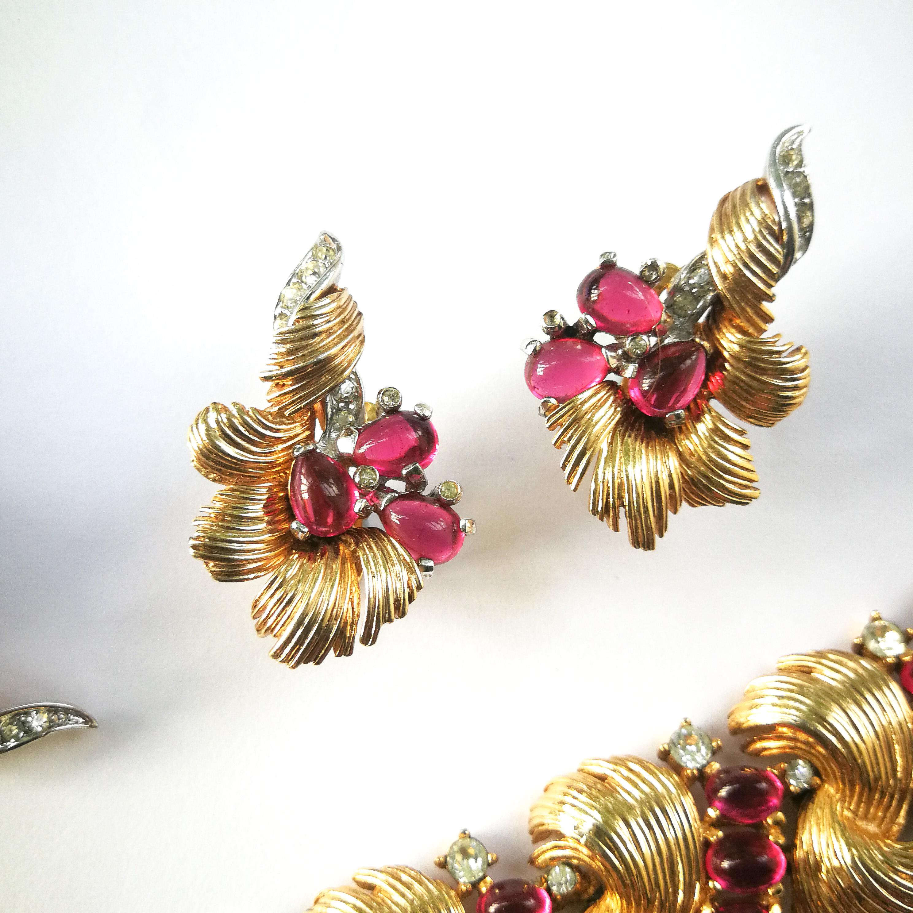 Women's Gilt metal, ruby and clear paste bracelet, brooch and earrings, Boucher, 1960s