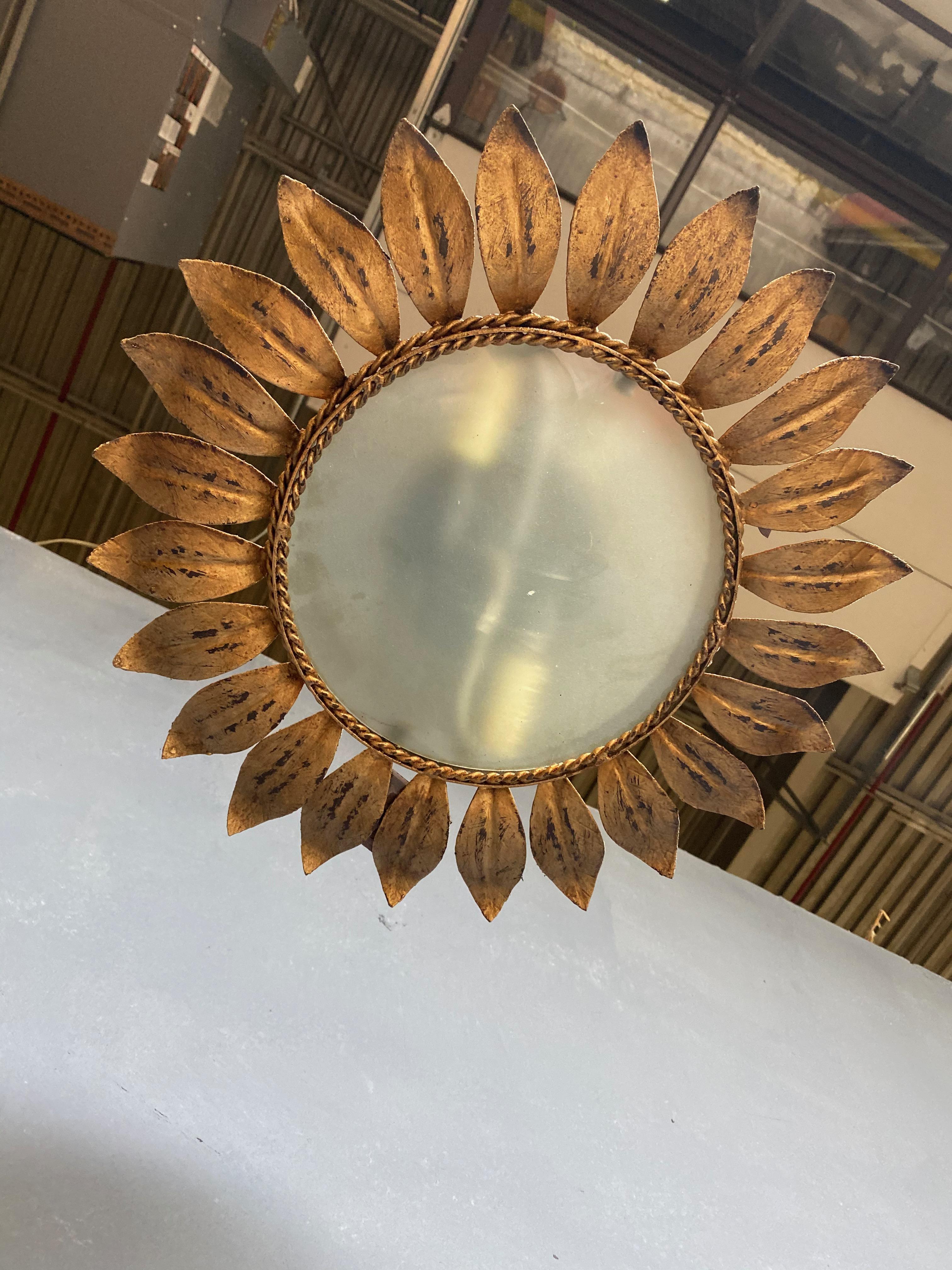 Gilt Metal Sunburst Ceiling Fixture with Radiating Leaf Design In Good Condition In Buchanan, NY