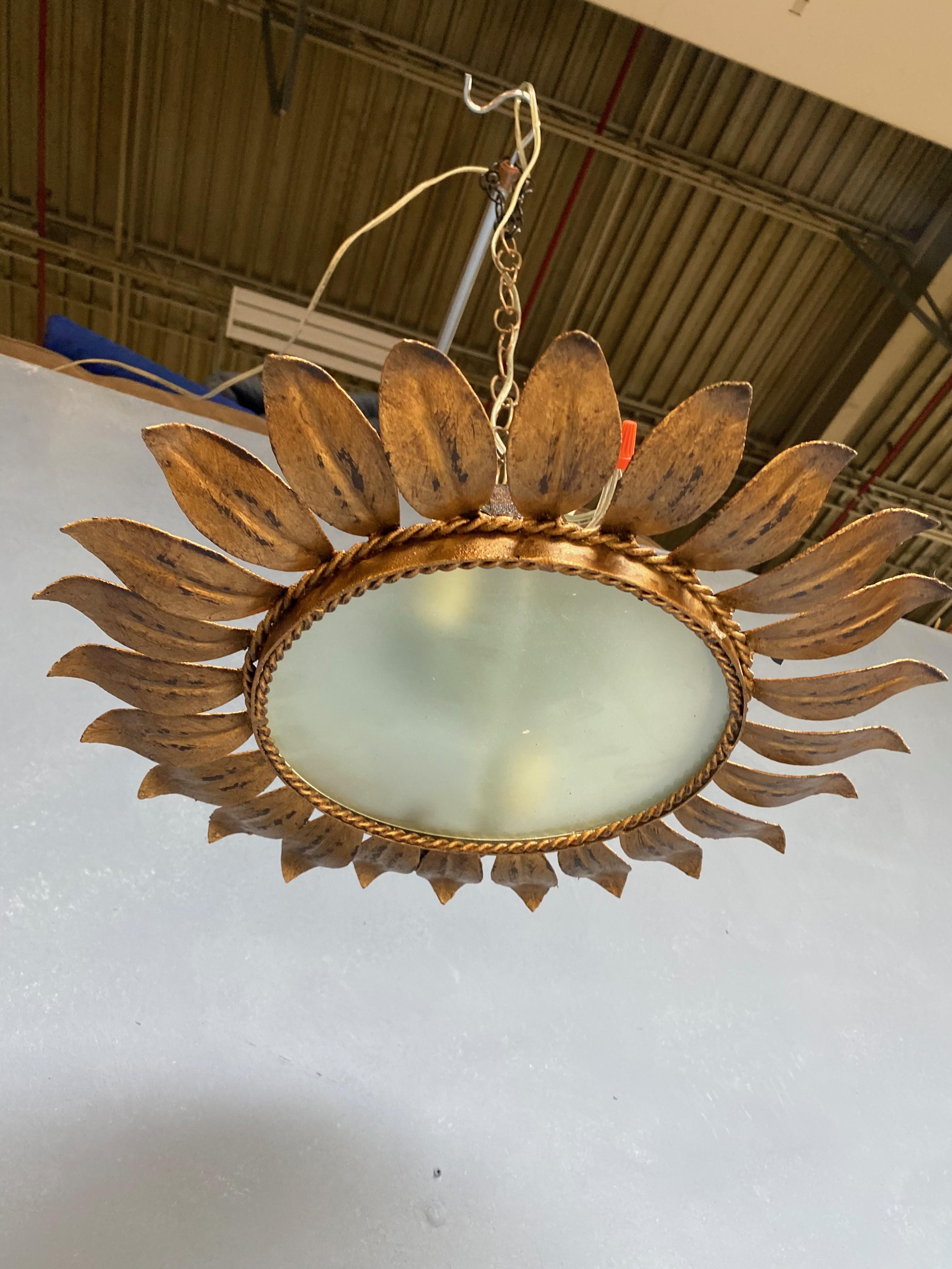 Gilt Metal Sunburst Ceiling Fixture with Radiating Leaf Design 1