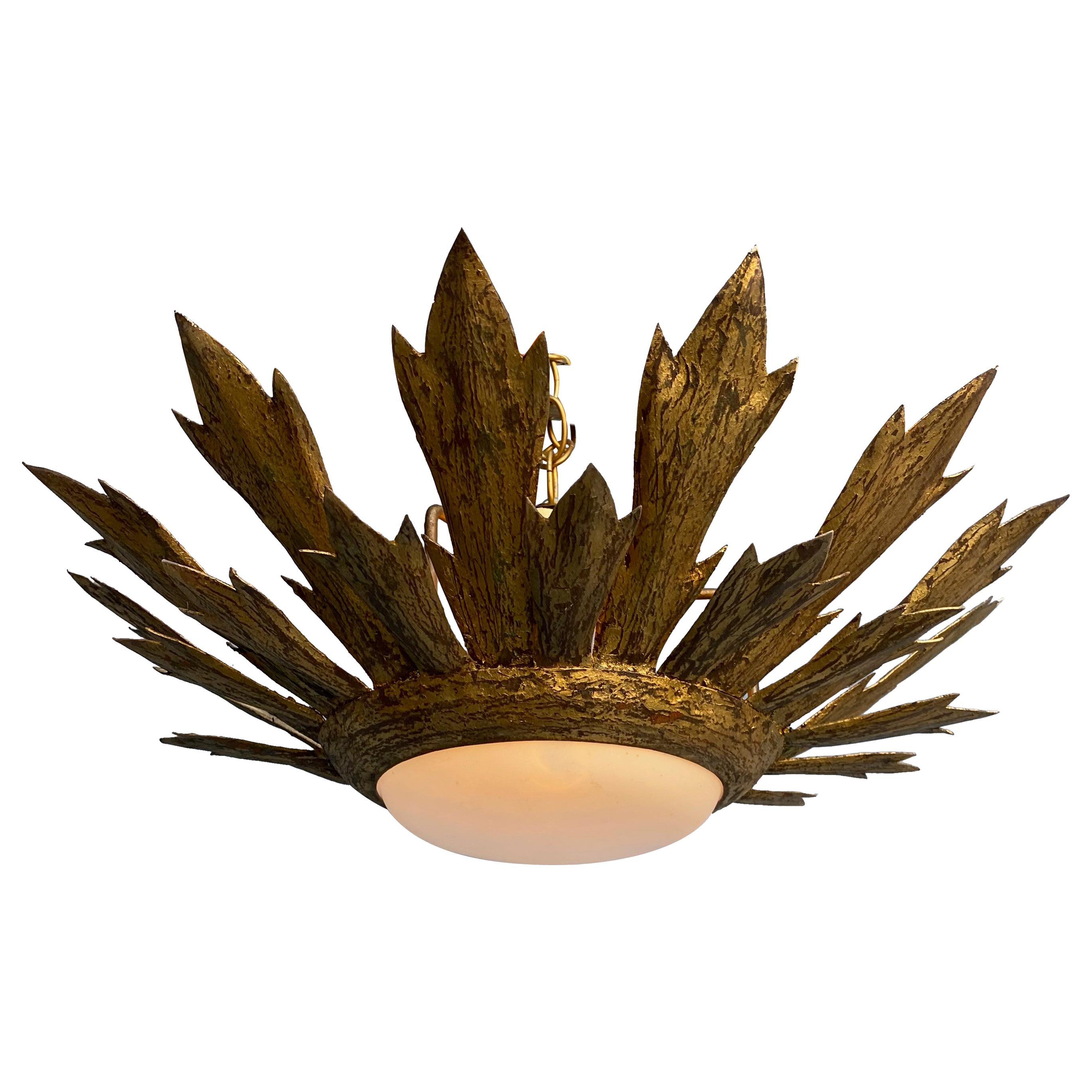 Gilt Metal Sunburst Flush Mount Ceiling Fixture With Convex Globe