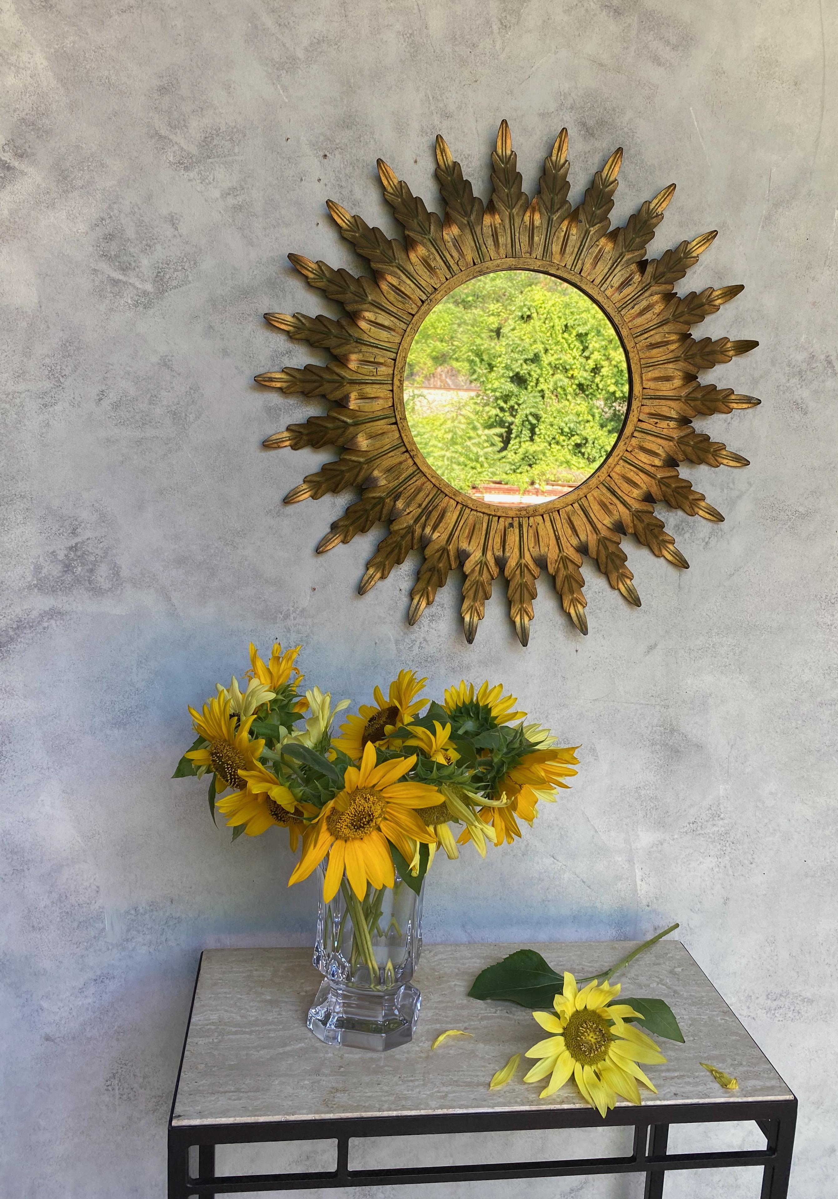 Spanish Gilt Metal Sunburst Mirror with Radiating Leaves and Traces of Green Hues