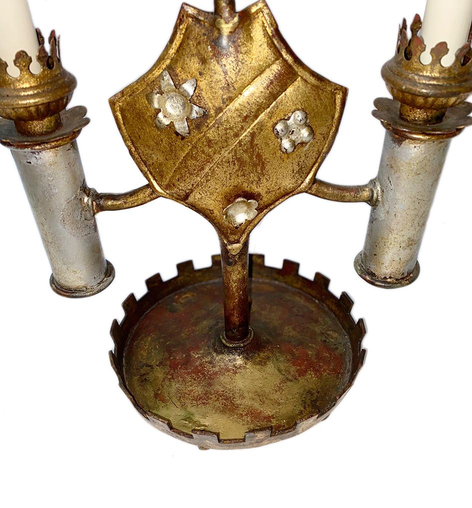 An Italian circa 1920's gilt metal lamp with shield motif on body and original patina.

Measurements:
Total height: 23.5