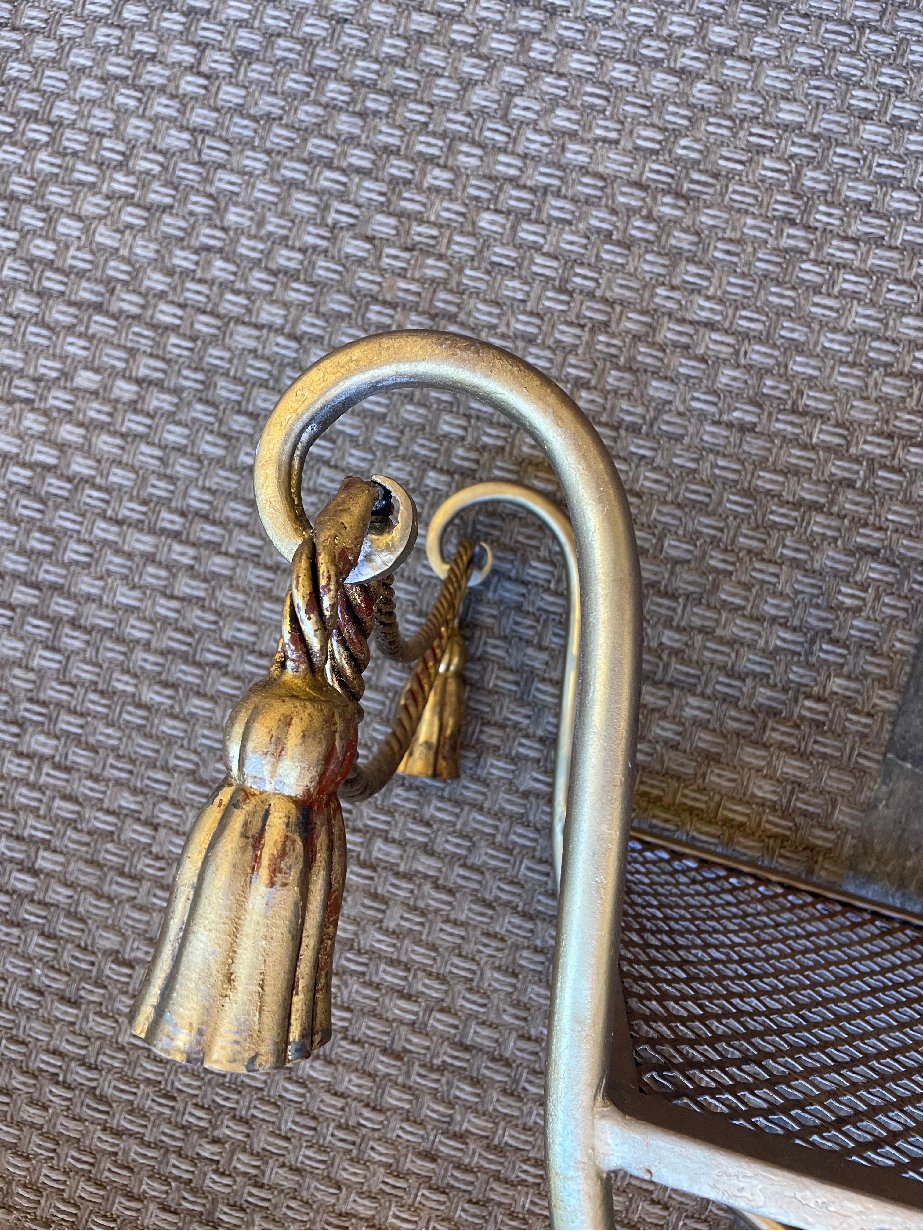 This is a wonderful gilt metal tassel bench made in Italy . Probably from 1950-60s in great condition 