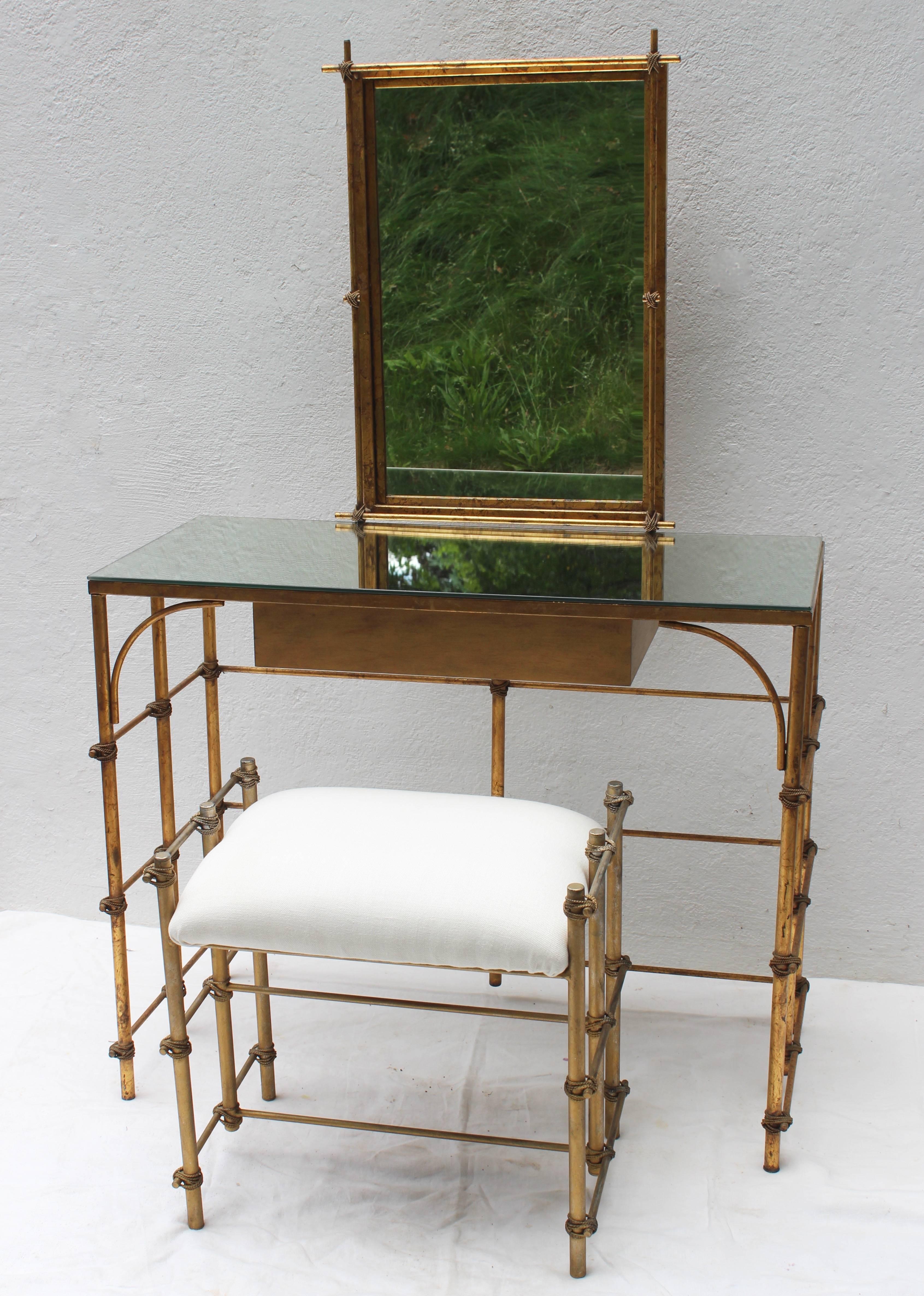 Gilt-metal Brutalist style mirrored table with matching stool and mirror... Make up table/ dressing table...
Table: 29.5