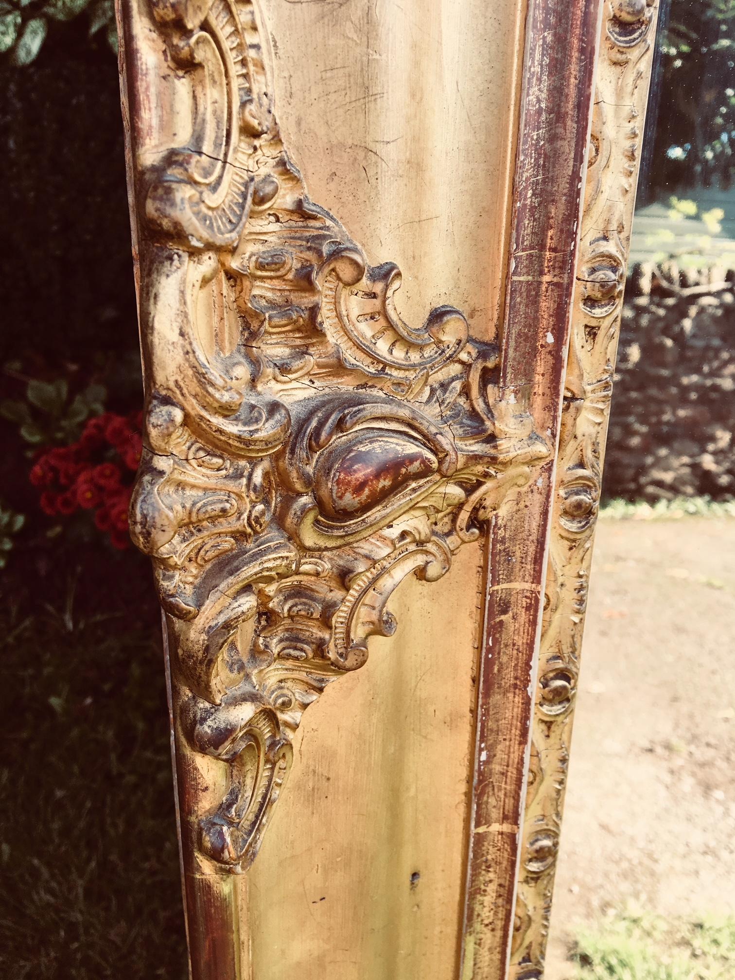 Attractive gilt mirror / overmantel in good used condition, French, circa 1890
This delightful mirror has its original glass with a few tiny blemishes, The frame is good and sound with a water gilded finish. Some small areas will be restored prior