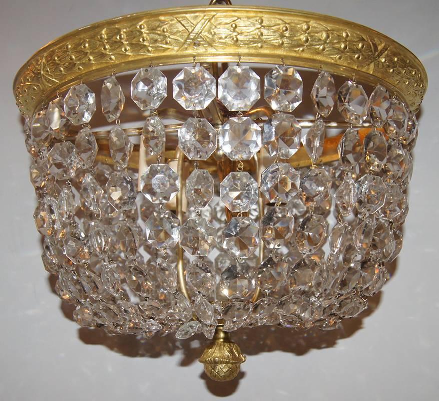 French gilt neoclassic light fixture, crystal body, circa 1920. Original finish. 

Measurements:
Diameter 16