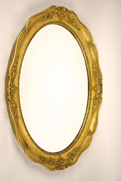 Gilt Oval Biedermeier Wall Mirror with Stucco Works, Austria, circa 1860