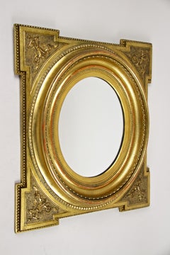 Gilt Oval Biedermeier Wall Mirror with Stucco Works, Austria, circa 1860