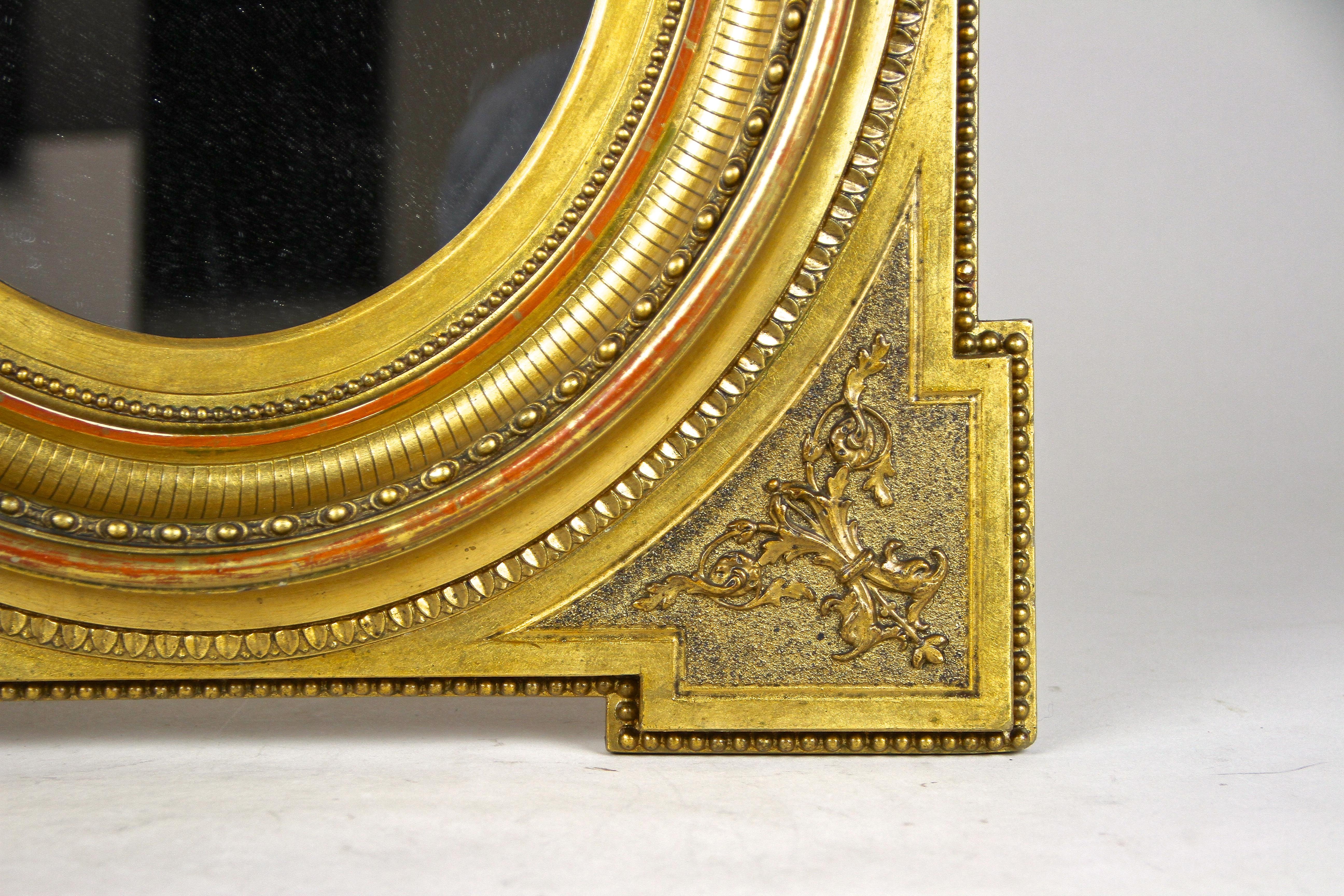 Gold Leaf Gilt Oval Biedermeier Wall Mirror with Stucco Works, Austria, circa 1860
