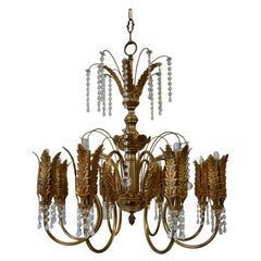 Lampadario Hollywood Regency con foglie di palma dorate e cristalli