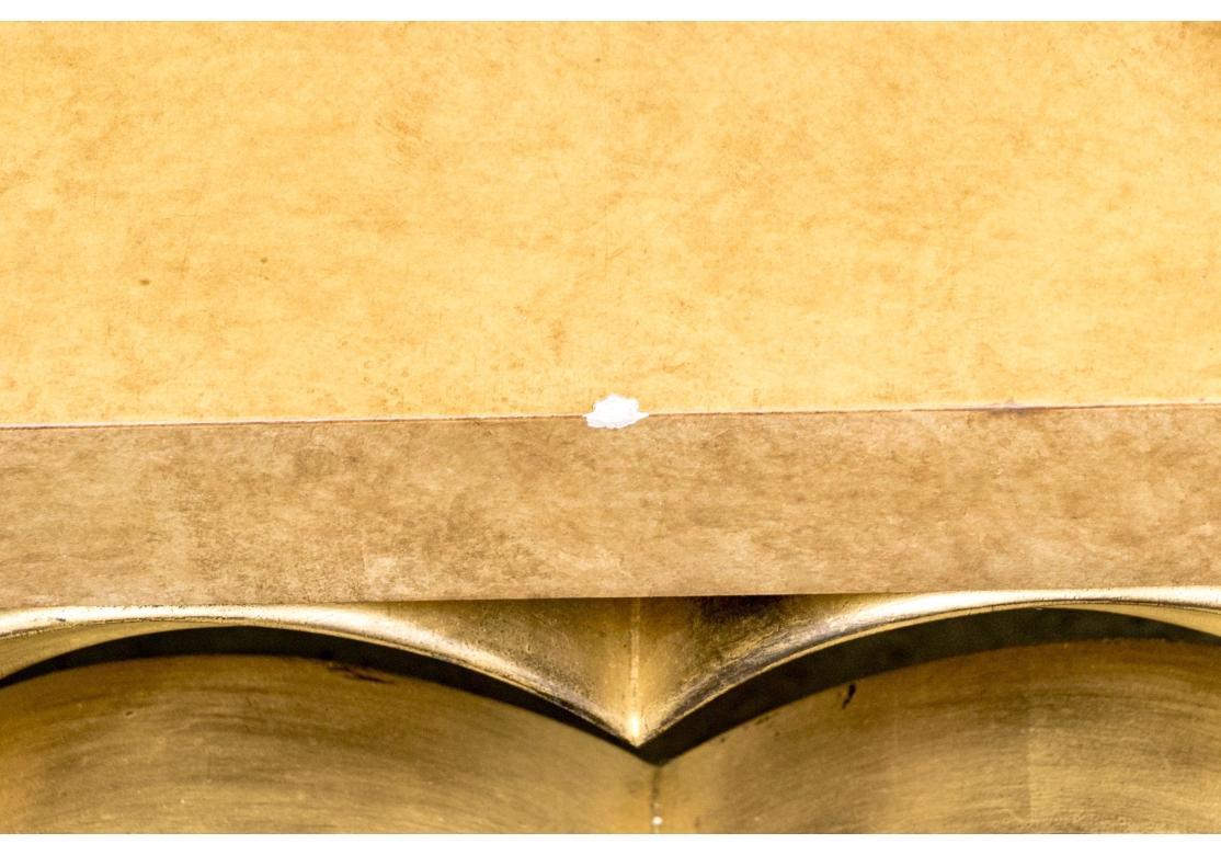 The Classic Hollywood Regency design by Robsjohn Gibbings here interpreted with double gilt Palm motifs in a much larger size with a sophisticated mottled Autumn tone painted finish. 

Dimensions: 60” wide by 44” deep by 16.5” high. 

Condition: