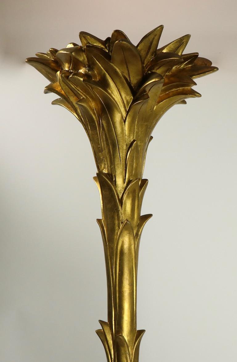 Impressive gold gilt floor lamp, attributed to Serge Roche. Very good, original and working condition, clean and ready t use. Measures: Diameter at top 19 x diameter at base 18 (inches)
We believe this is a period 1930s example from France, however