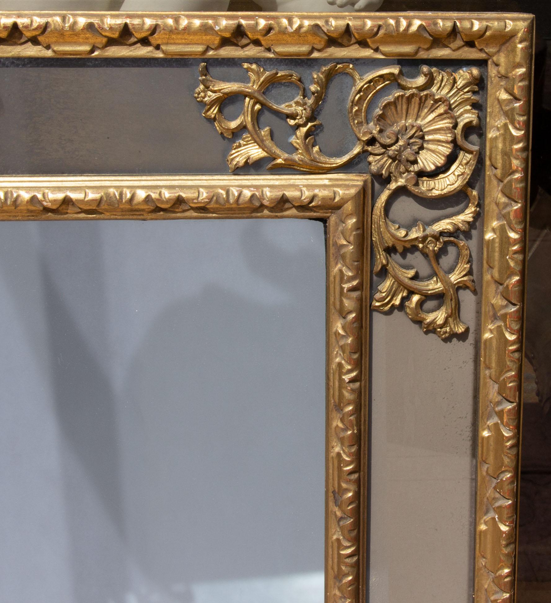 Carved and gilt paneled mirror. Side panels are smoked mirror. Midcentury. See our other mirrors. Please, contact us for shipping options.
Presented by Joseph Dasta Antiques
