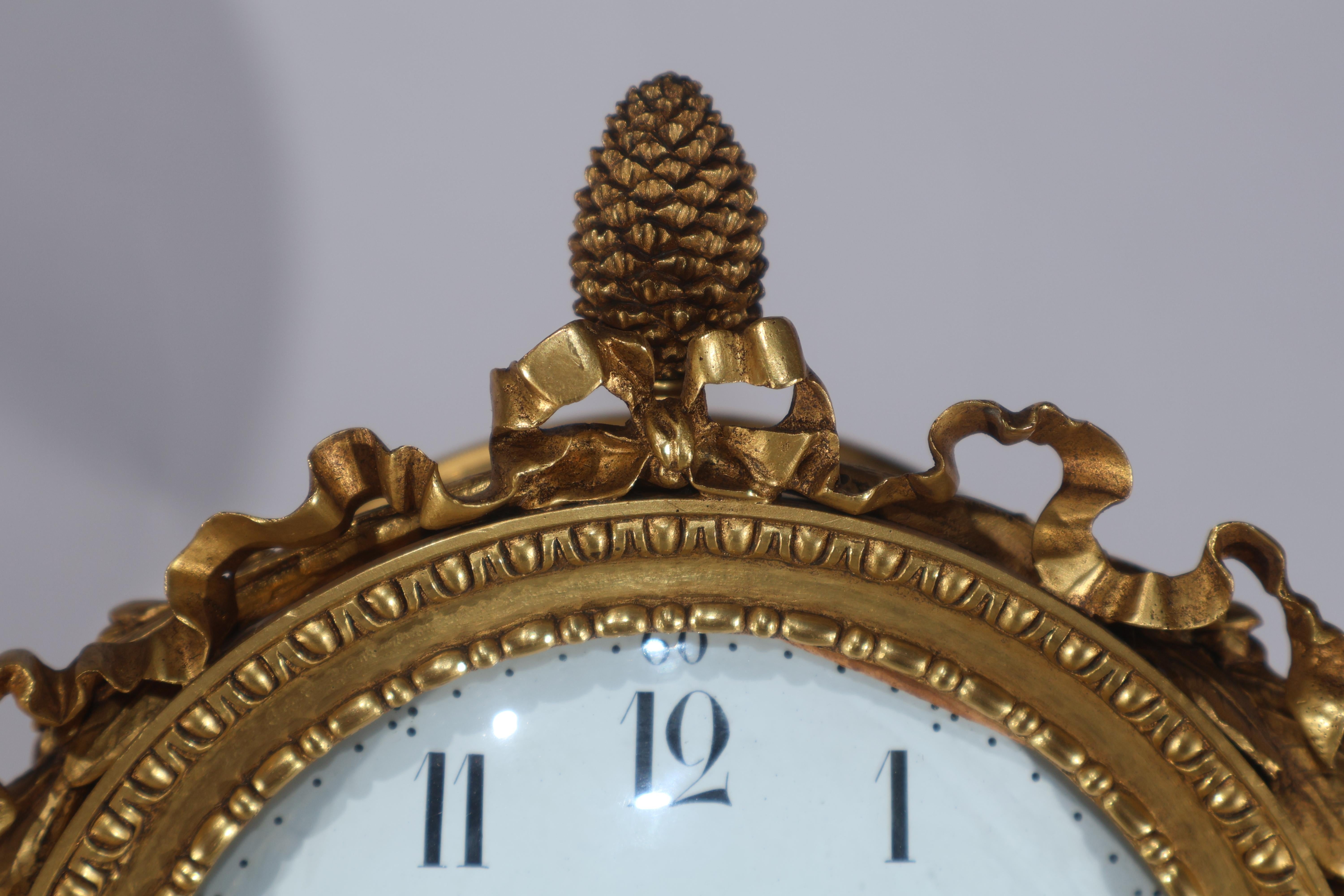Horloge en bronze doré et patiné avec aigle en vente 4