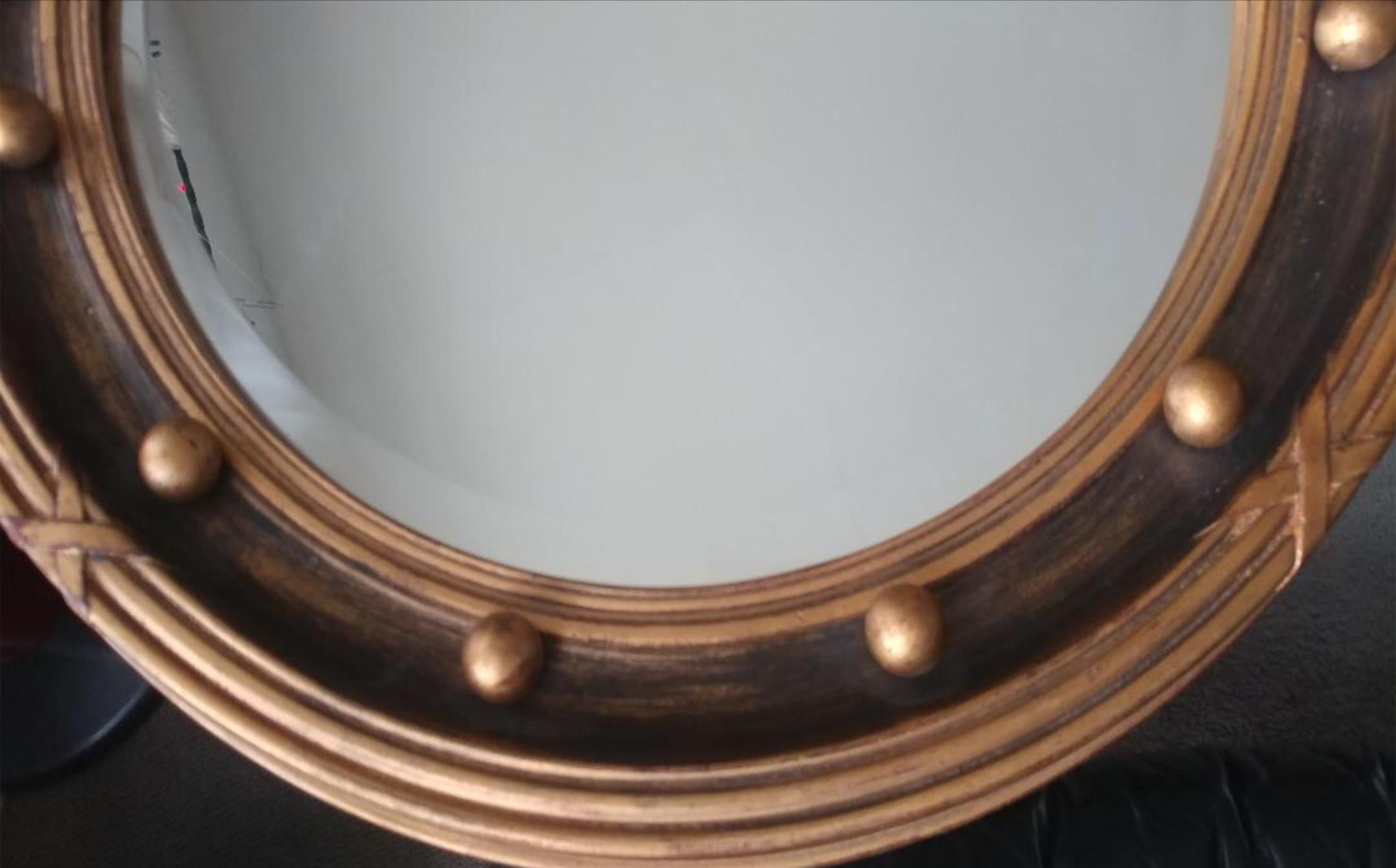 English Gilt Patinated Convex Mirror, Offered by La Porte For Sale