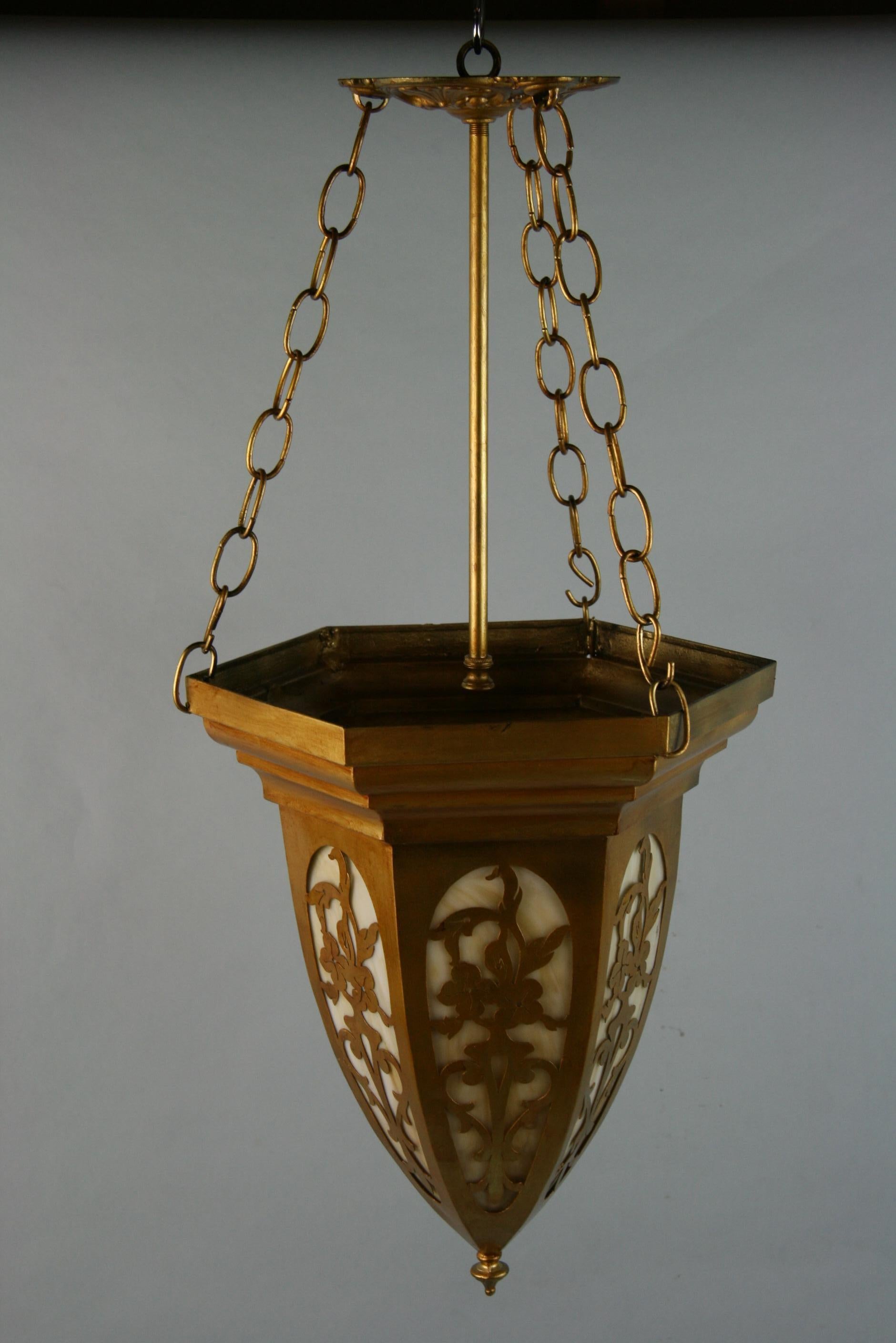 Mid-20th Century Chain Hung Gilt Pierced Metal Bent Glass Pendant, 1940's For Sale