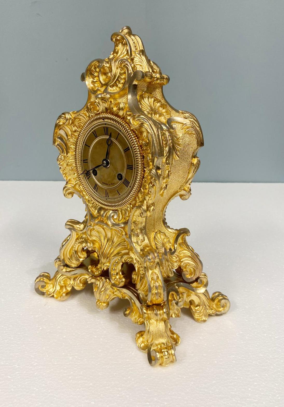Gorgeous antique French Rococo gilt mantel clock
Circa 1850
Signed to the clock face 'Dupont a Paris' who worked at Rue St Martin from 1850-1860
Eight day duration movement chiming on the hour
A highly decorative French Rococo gilt mantel clock,