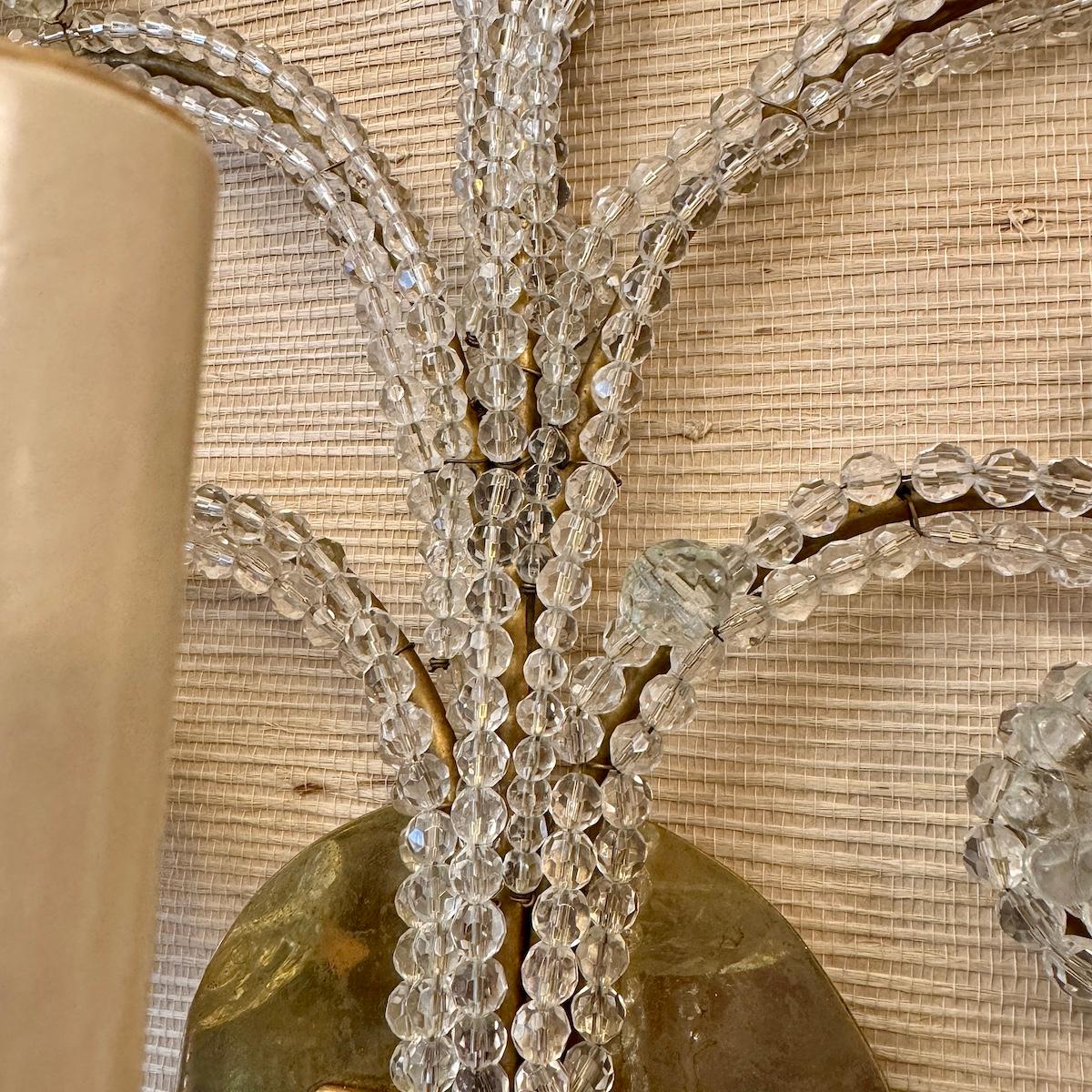 Apliques dorados con cuentas de cristal en venta 1