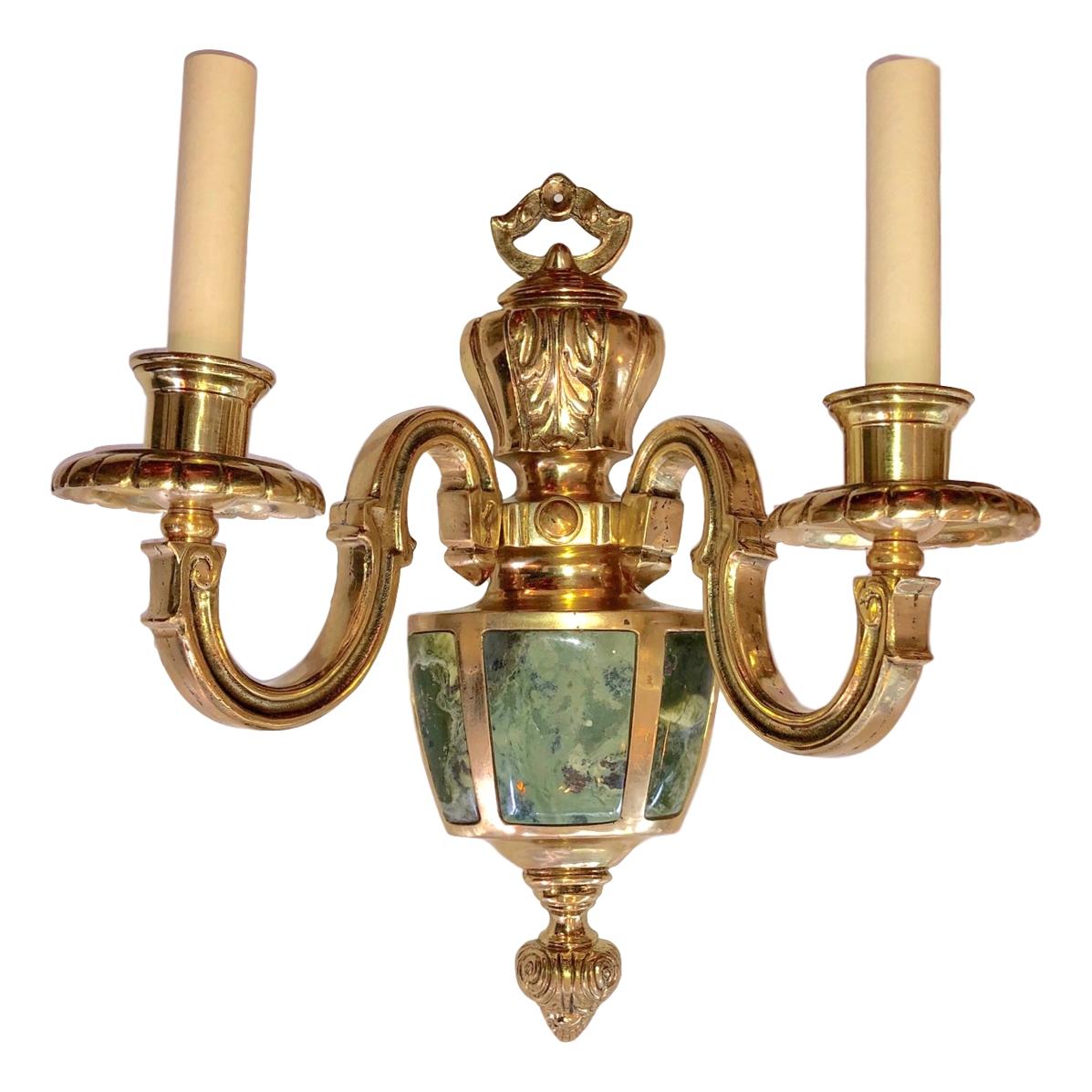 A set of four circa 1930s French bronze and stone two-arm sconces with Jadeite stone insets. Sold per pair.

Measurements:
Height: 14