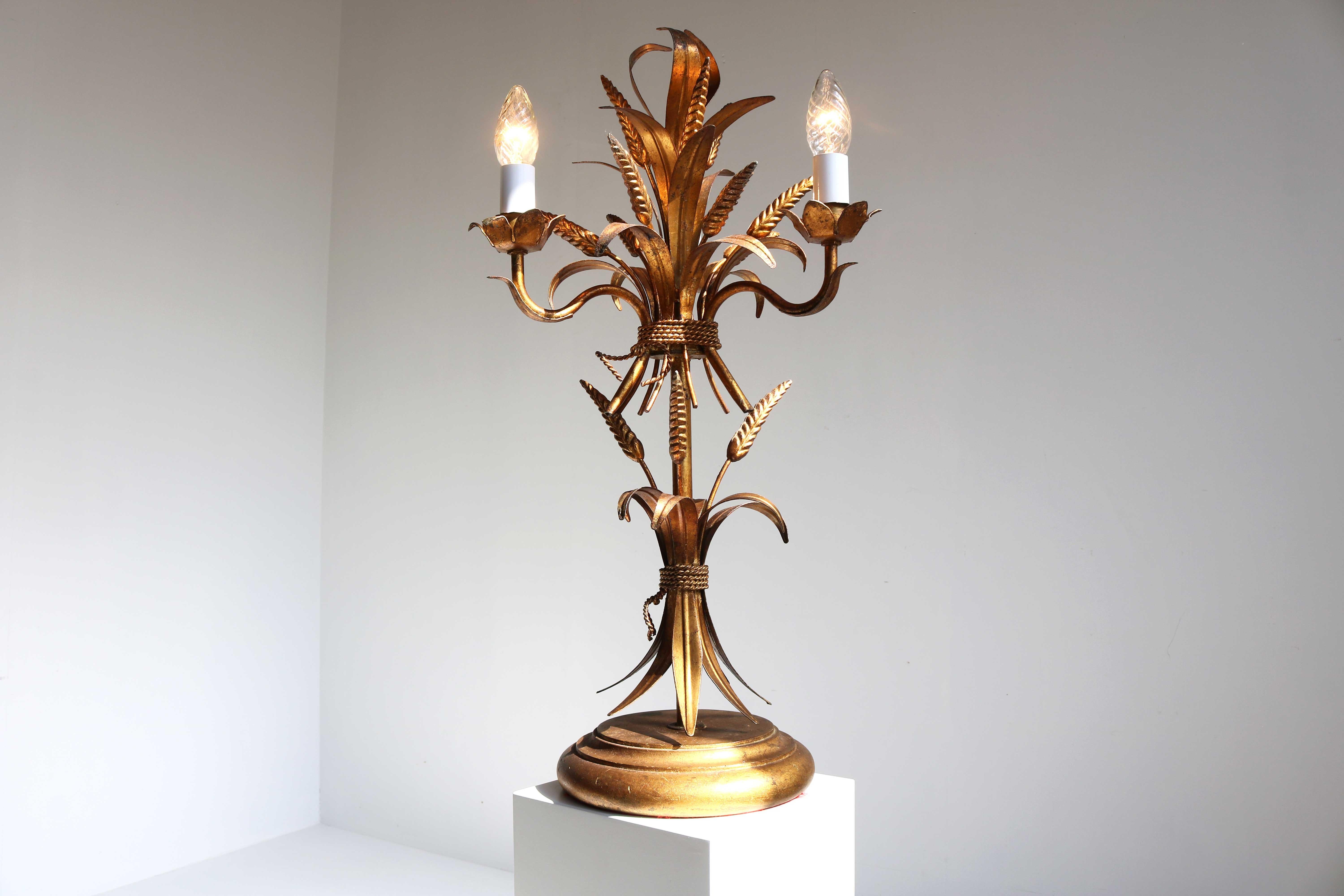 Hans Kögl wheat sheaf table lamp, circa 1960s statement wheat sheaf and gilt leaf lamp by Hans Kögl
Beautiful Hollywood Regency Italian florentine gilt metal table lamp with the imagery of ‘sheaf of wheat’. 
In great and fully working condition.