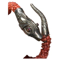 Pulsera brazalete de serpiente con envoltura de coral en plata dorada antigua