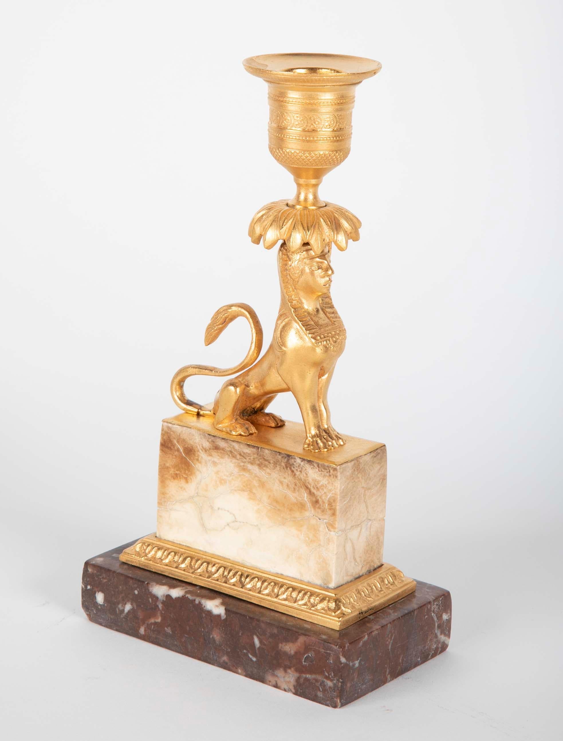 Gilt Sphinx Themed Candlestick on a Stepped Marble Base For Sale 1