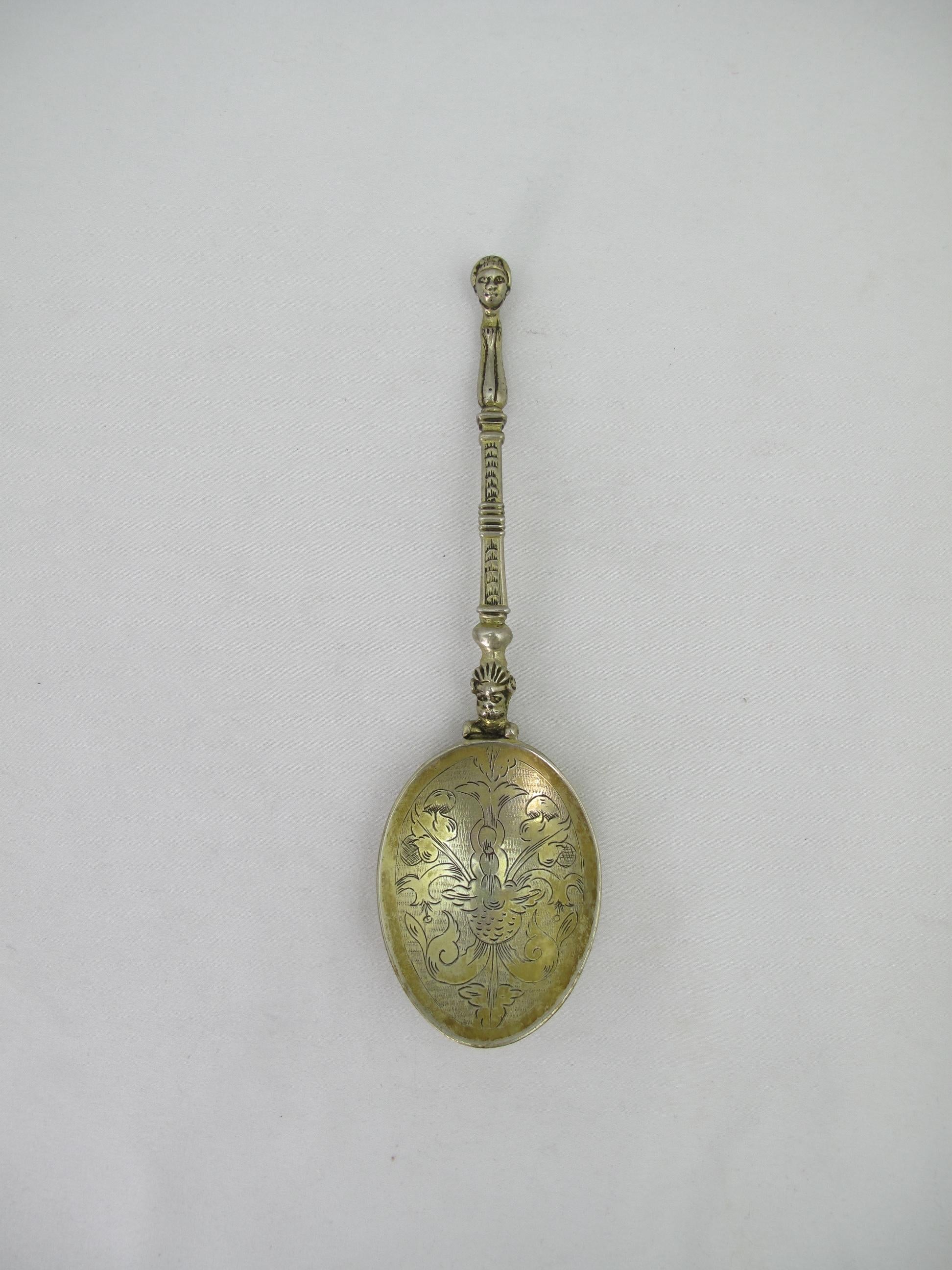 Rare early 17th century gilt sterling silver spoon, Barnstaple, circa 1610. Attributed to the greatest* English spoon maker of all time John Quick / Quycke**. 

The interior of the oval bowl engraved with stylized fruit, foliage, and strapwork on