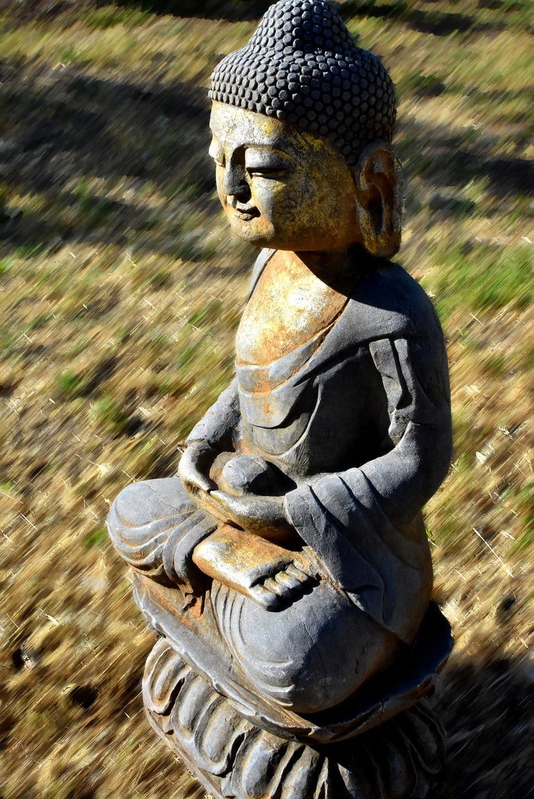 Gilt Stone Buddha Statue Holding a Pearl, Hand Carved For Sale at 1stdibs