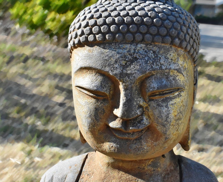 Gilt Stone Buddha Statue Holding a Pearl, Hand Carved For Sale at 1stdibs