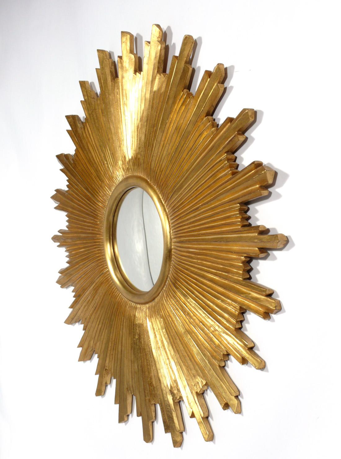 Gilt starburst convex mirror, made for carvers guild, circa 2000s.
