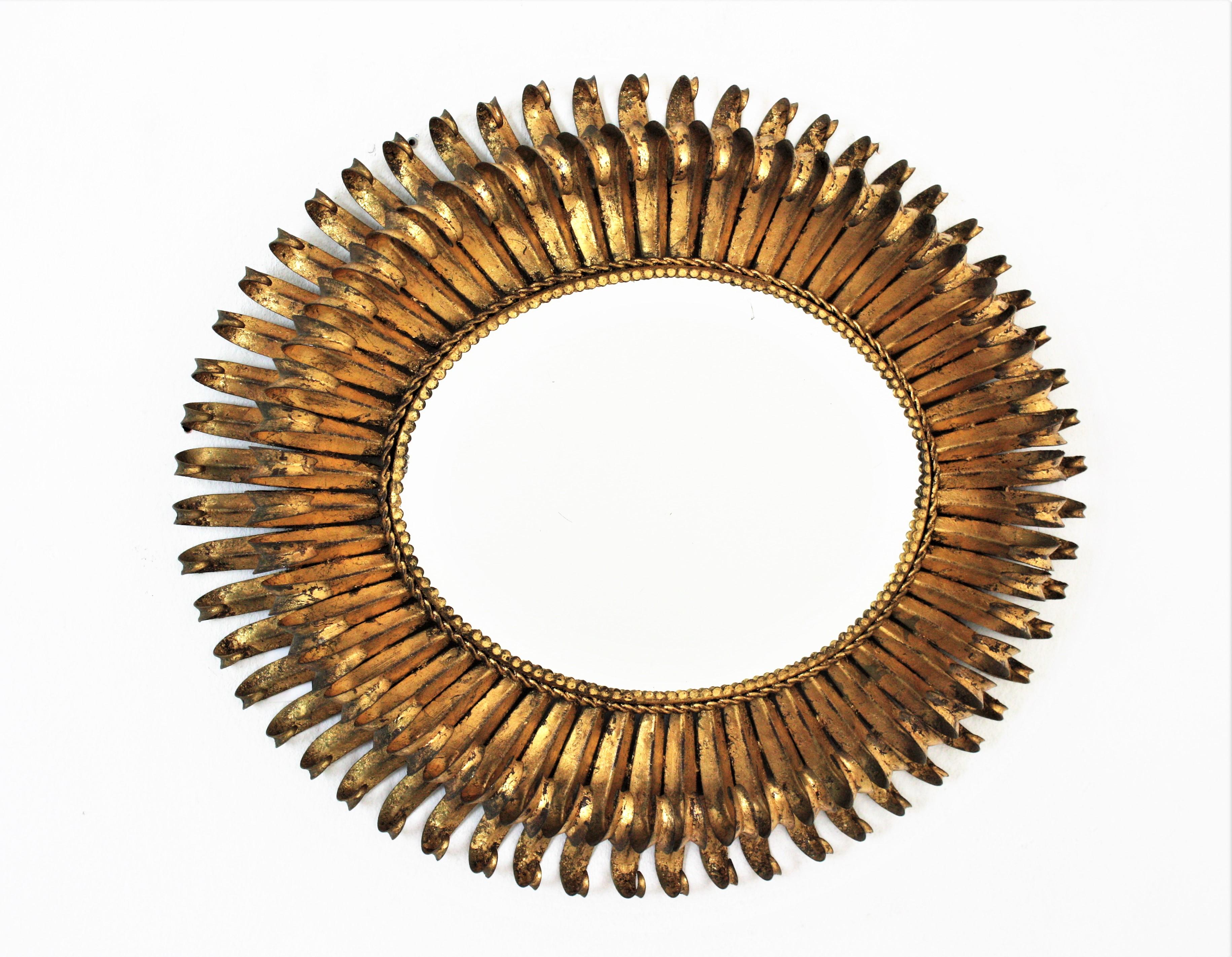 Mid-Century Modern Gilt Sunburst Eyelash Oval Mirror in Wrought Iron For Sale
