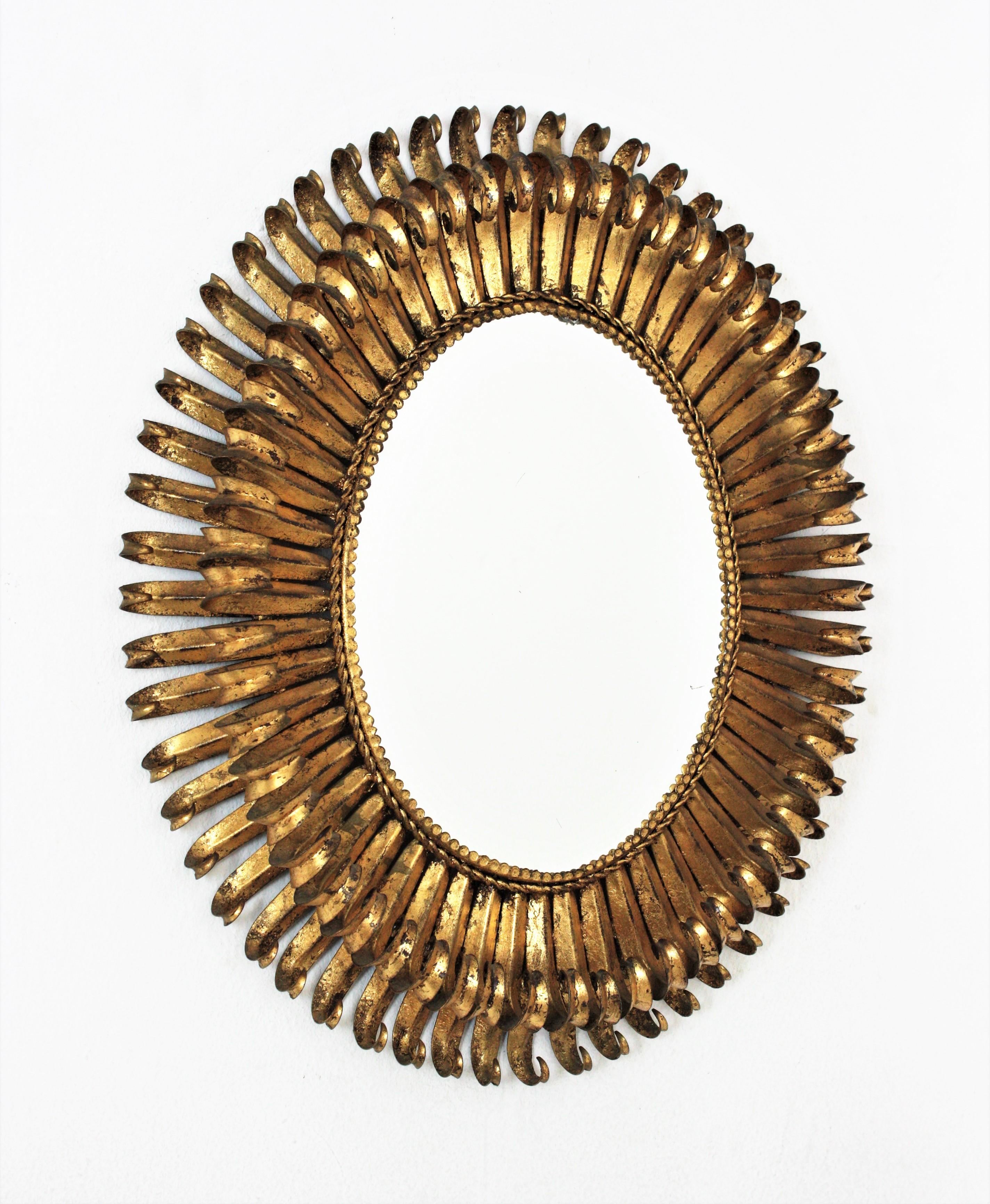 French Gilt Sunburst Eyelash Oval Mirror, Wrought Iron, 1950s For Sale