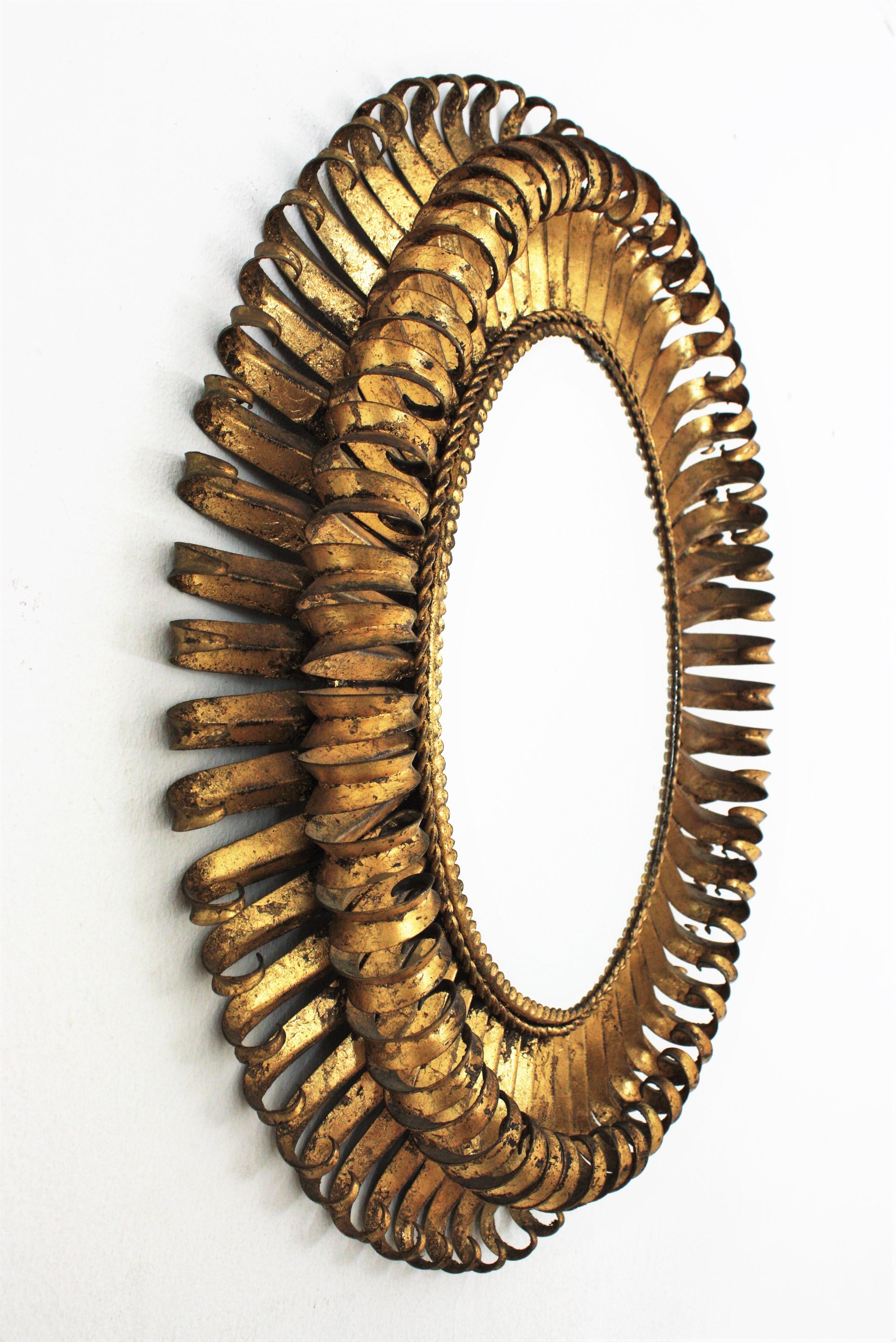 Metal Gilt Sunburst Eyelash Oval Mirror, Wrought Iron, 1950s For Sale