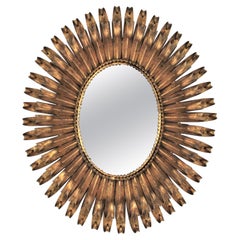 Gilt Sunburst Eyelash Oval Mirror in Wrought Iron