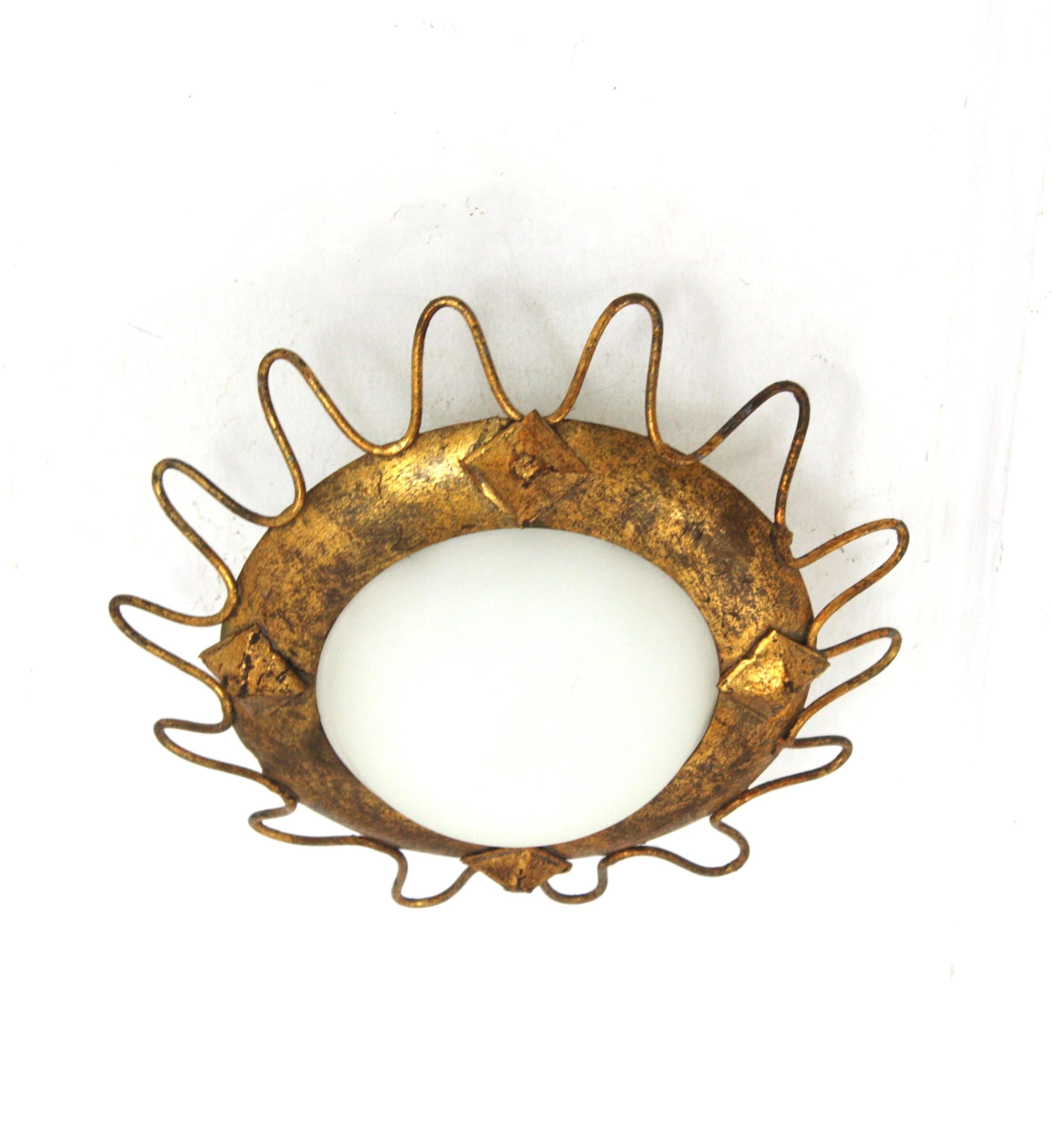 French Gilt Sunburst Light Fixture with Milk Glass Shade and Loop Detail For Sale