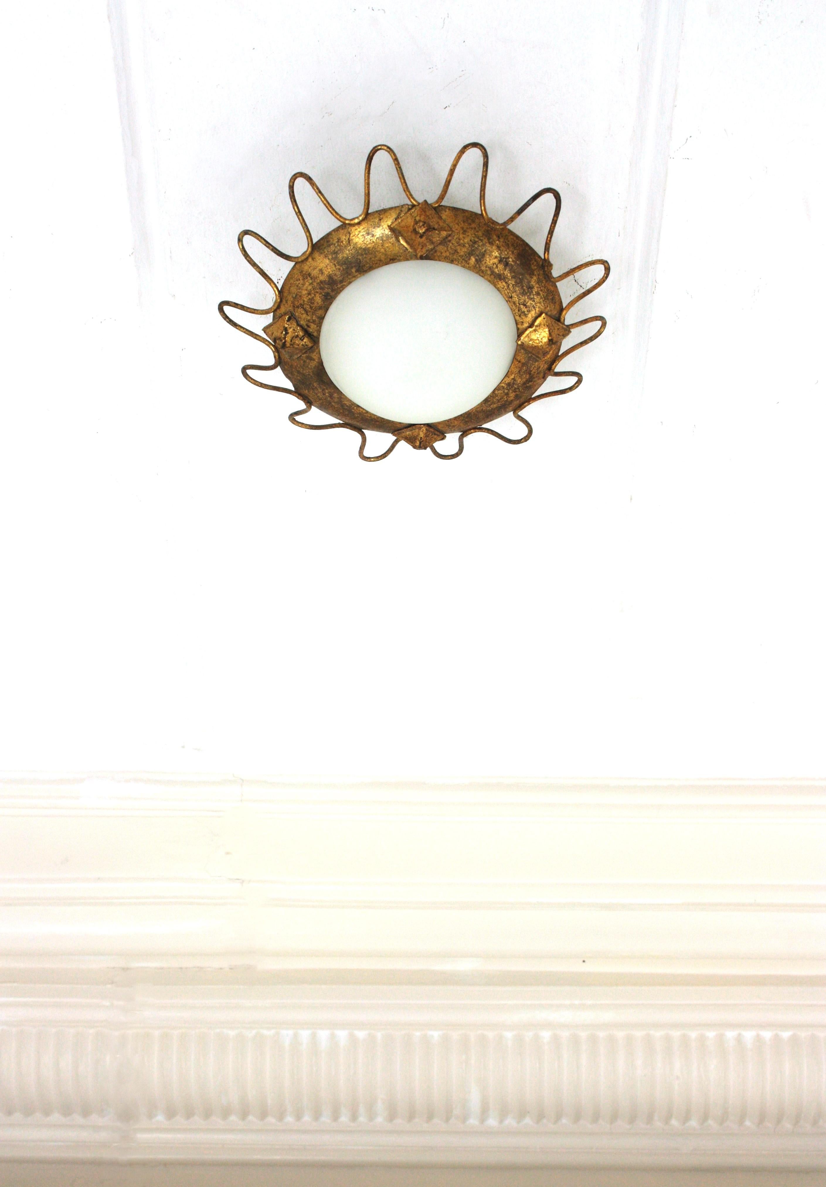 Gilt Sunburst Light Fixture with Milk Glass Shade and Loop Detail In Good Condition In Barcelona, ES