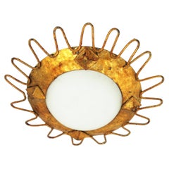 Gilt Sunburst Light Fixture with Milk Glass Shade and Loop Detail