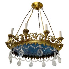 Lustre suédois doré avec verre bleu